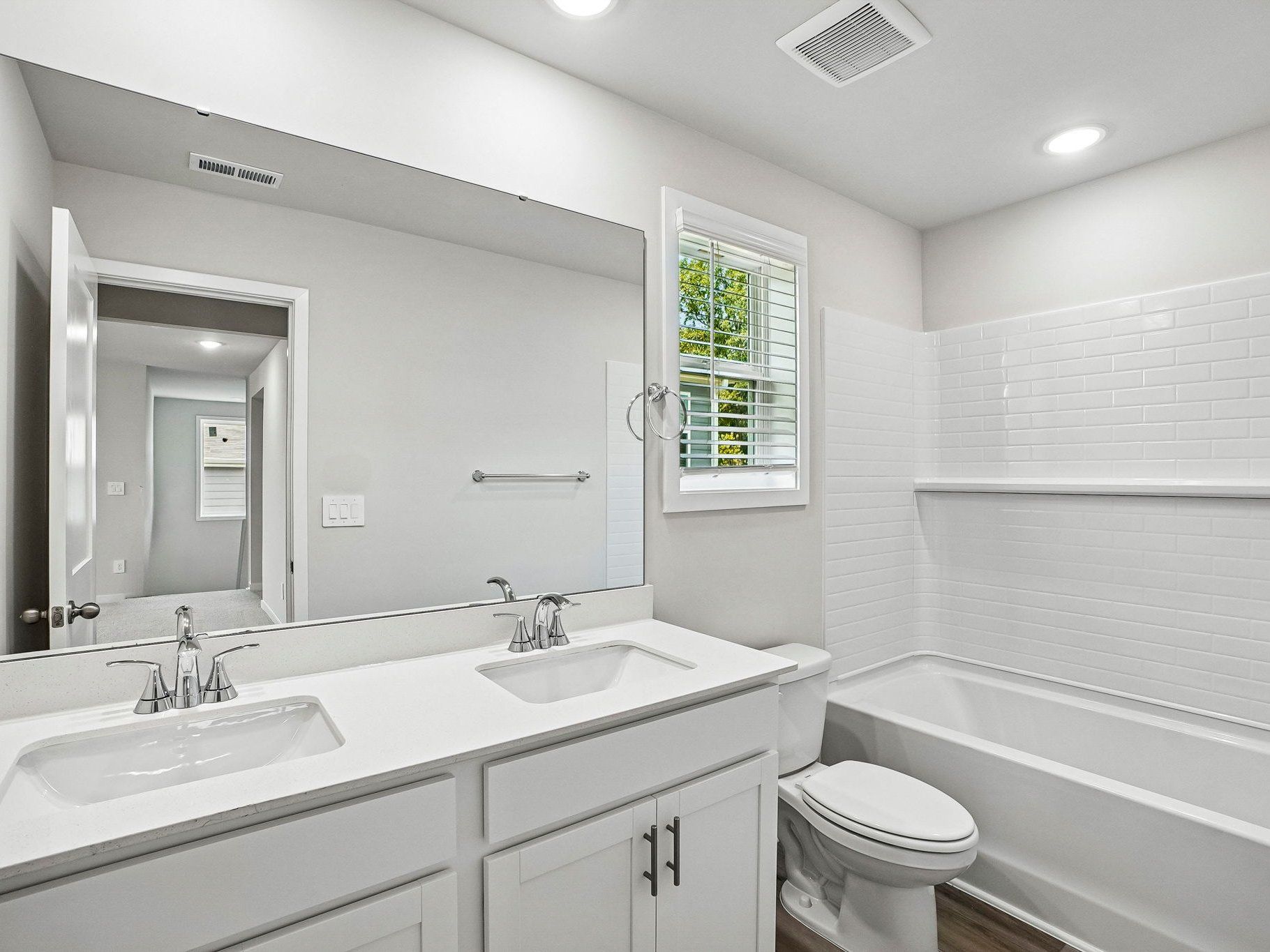 Secondary bathroom in the Wilson floorplan at a Meritage Homes community in Clayton, NC.