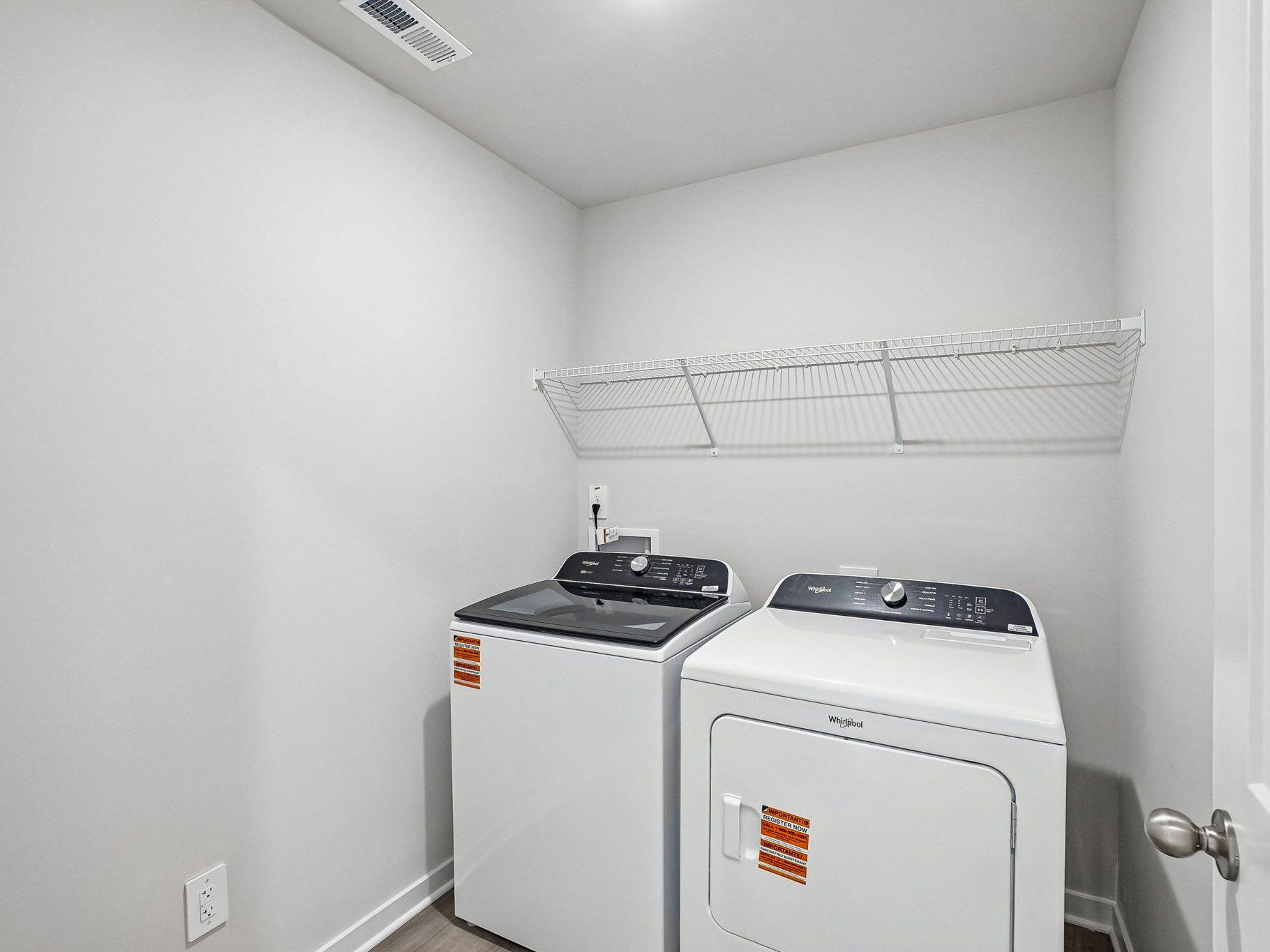 Laundry room in the Wilson floorplan at a Meritage Homes community in Clayton, NC.