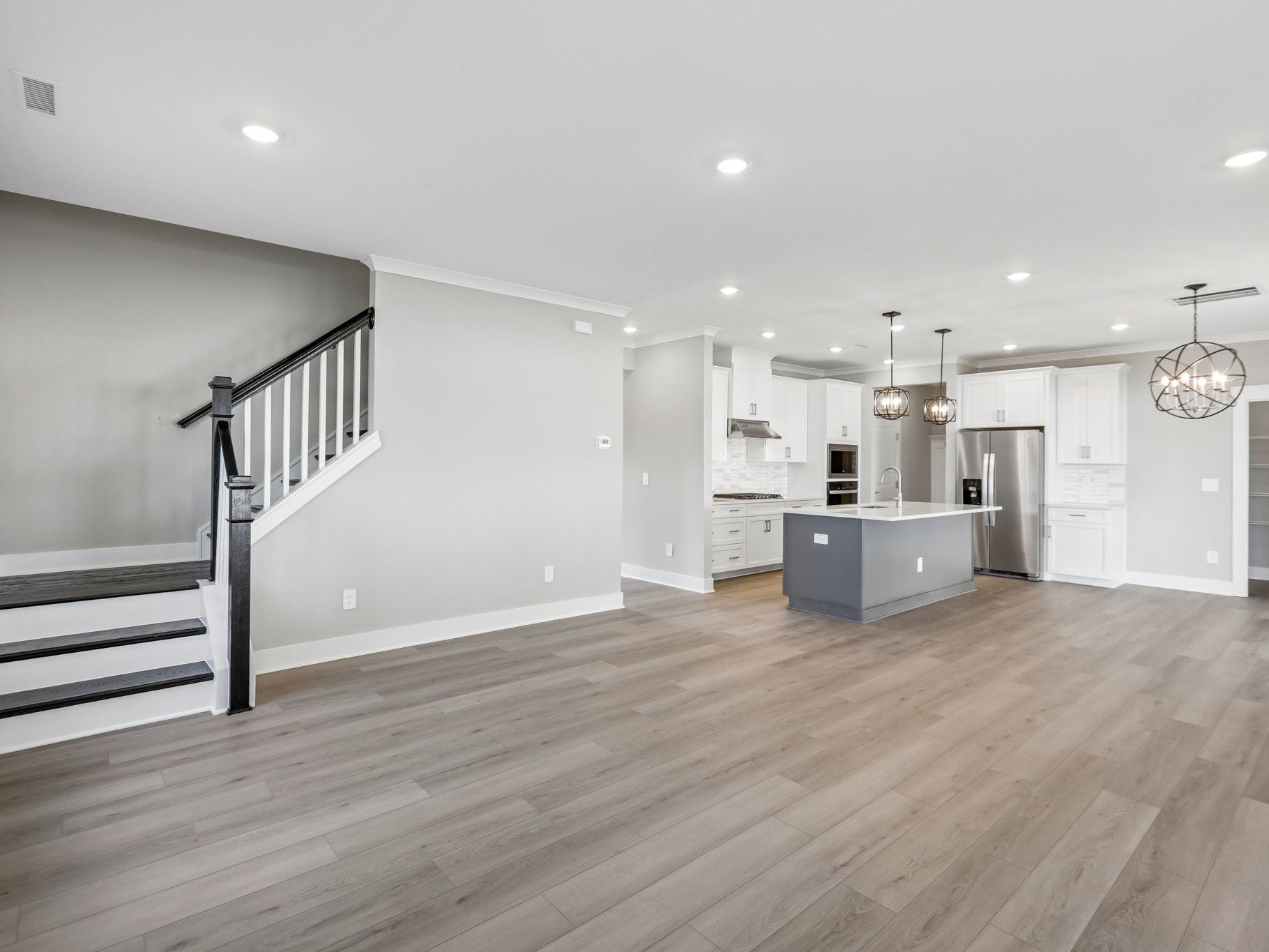 Great room in the Brentwood floorplan at a Meritage Homes community in Raleigh, NC.