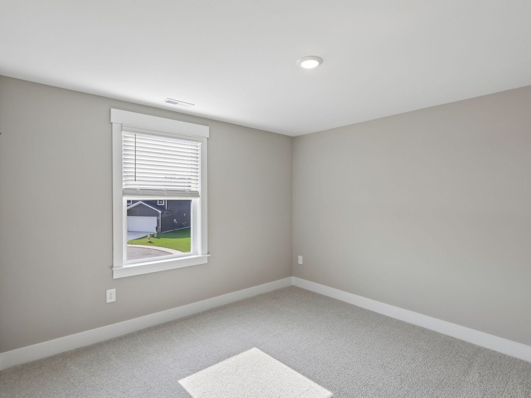 Secondary bedroom in the Brentwood floorplan at a Meritage Homes community in Raleigh, NC.