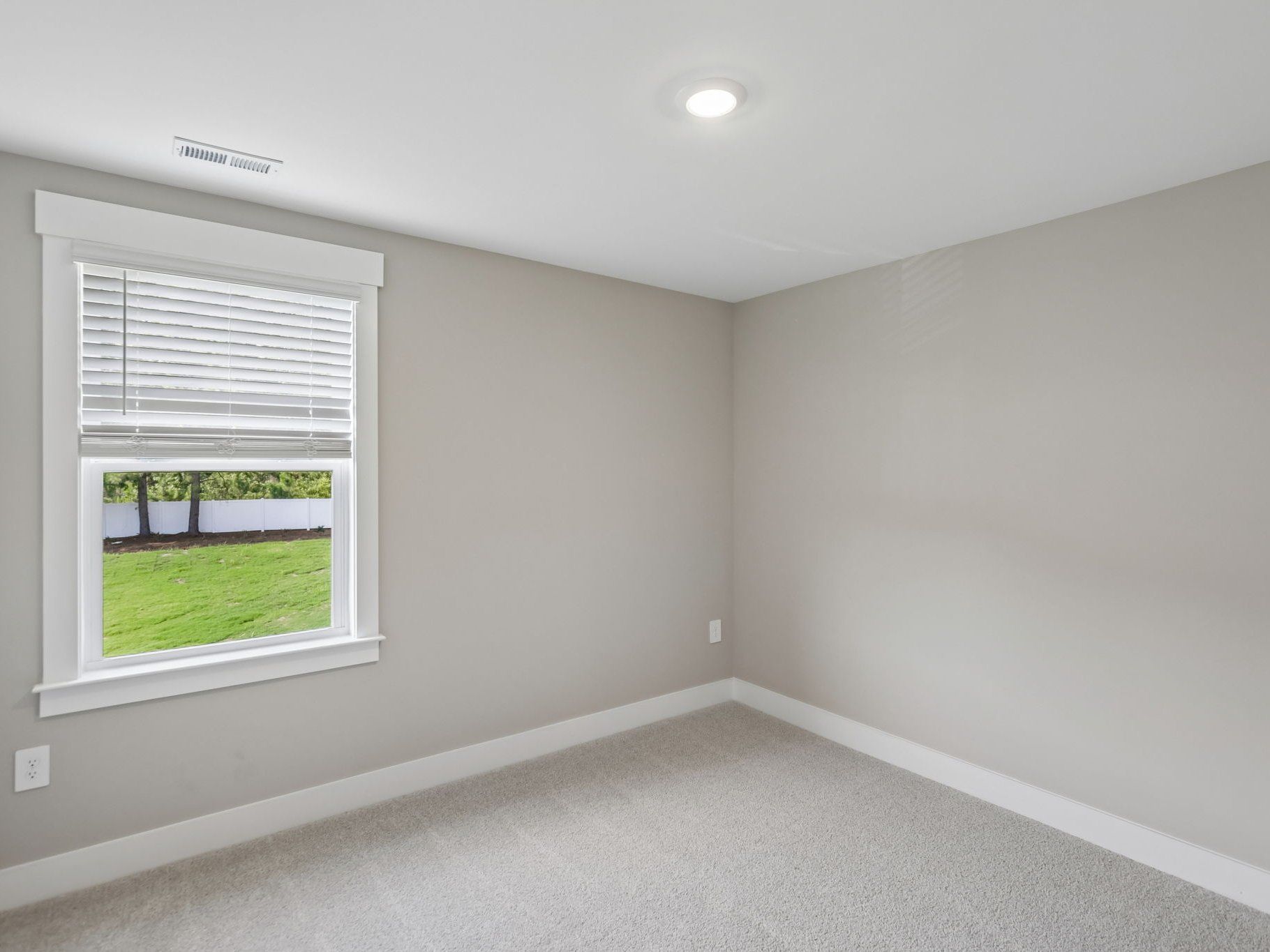 Secondary bedroom in the Brentwood floorplan at a Meritage Homes community in Raleigh, NC.