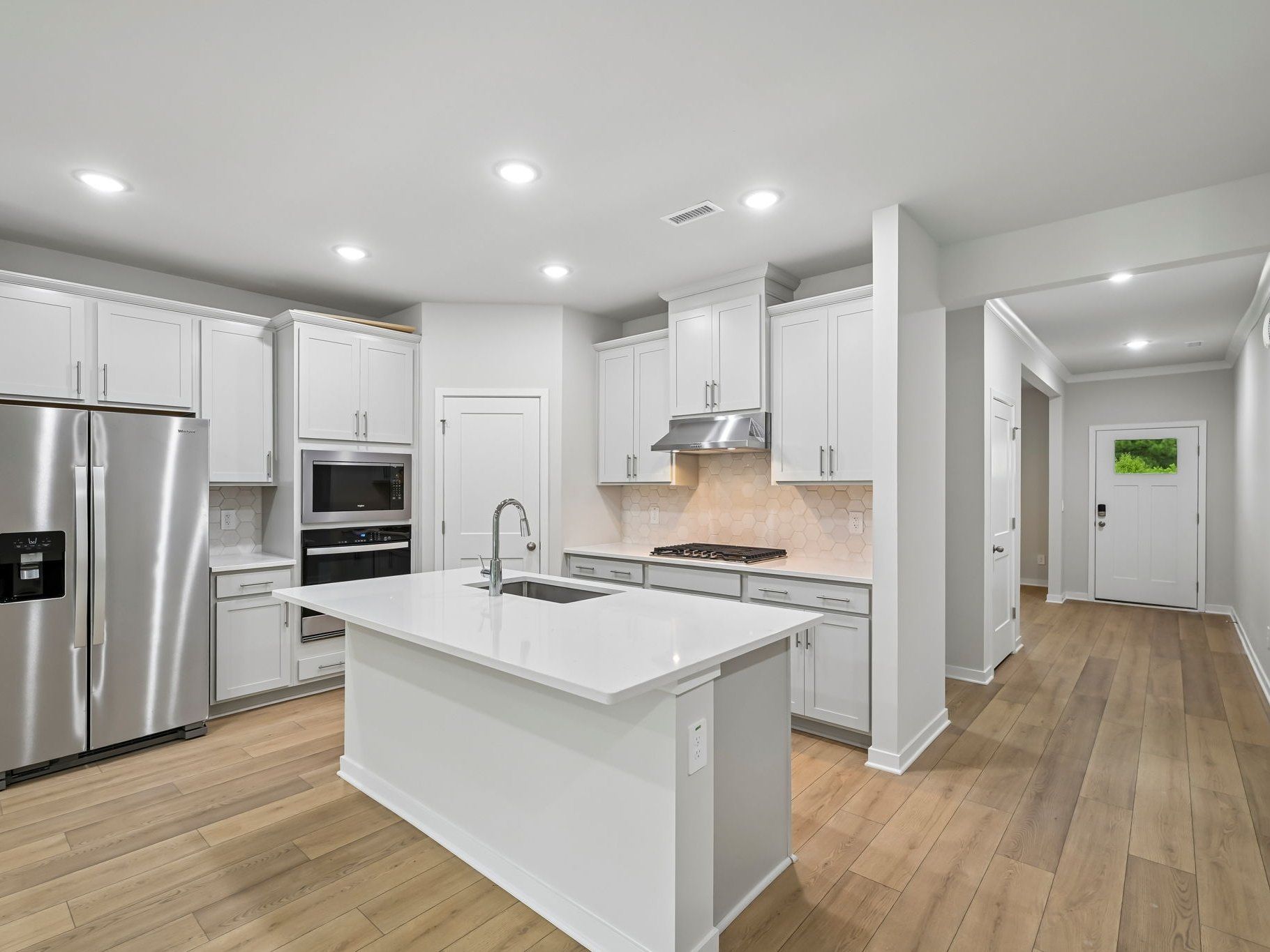 Kitchen in the Chatham floorplan at a Meritage Homes community in Wendell, NC.