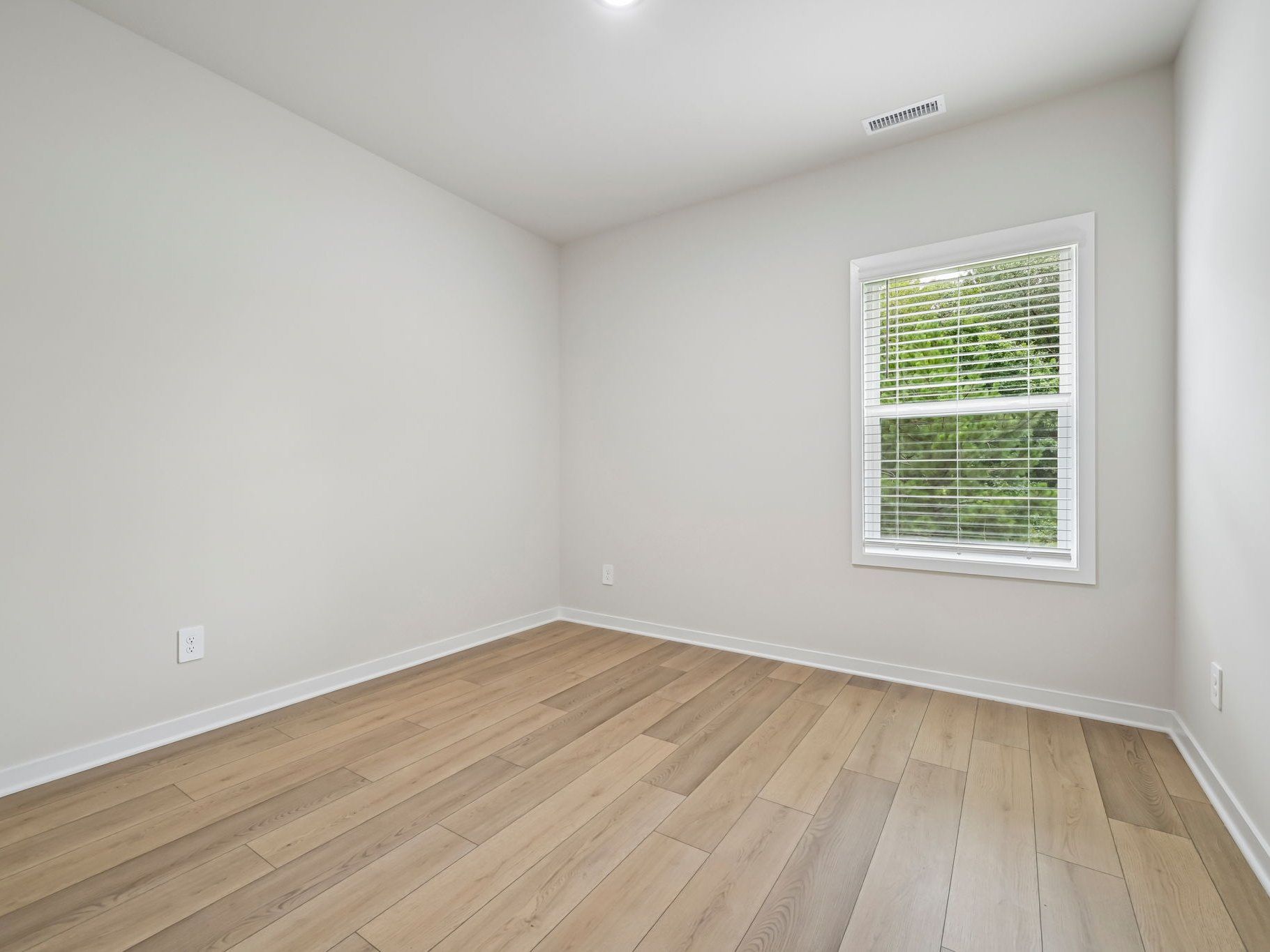 Secondary bedroom in the Chatham floorplan at a Meritage Homes community in Wendell, NC.