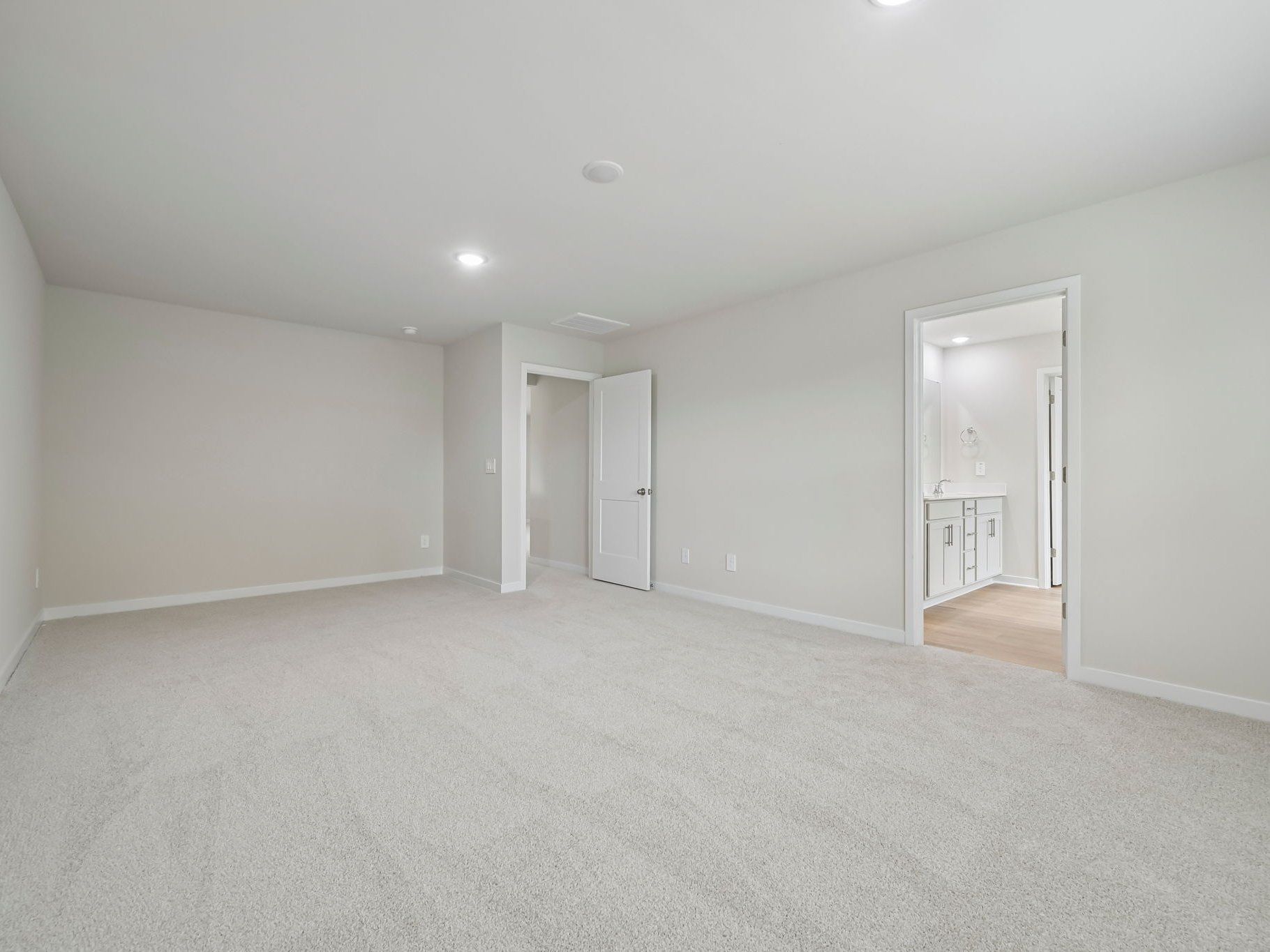 Primary bedroom in the Chatham floorplan at a Meritage Homes community in Wendell, NC.