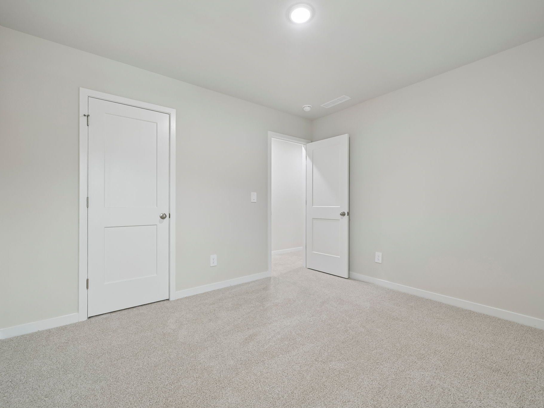 Secondary bedroom in the Chatham floorplan at a Meritage Homes community in Wendell, NC.