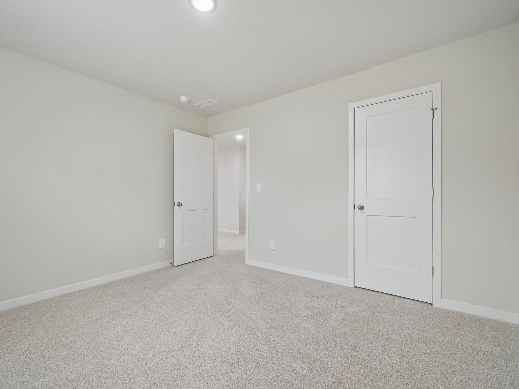 Secondary bedroom in the Chatham floorplan at a Meritage Homes community in Wendell, NC.