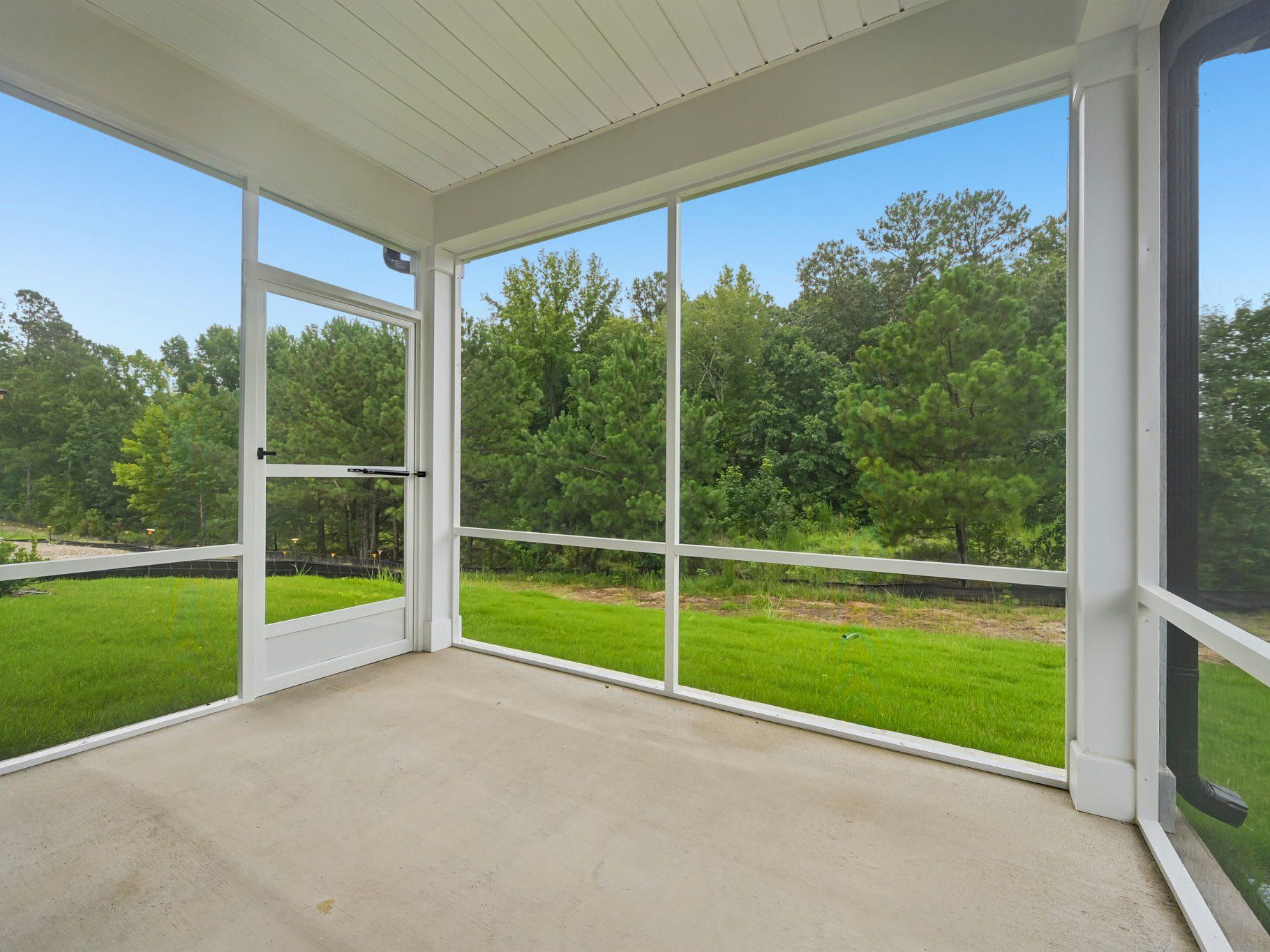 Screened-in patio in the Chatham floorplan at a Meritage Homes community in Wendell, NC.