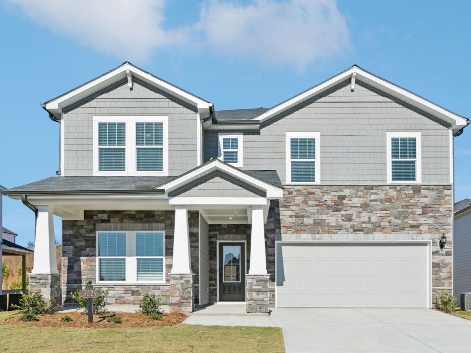 The Taylorsville floorplan with Elevation K modeled at Ivey Township.