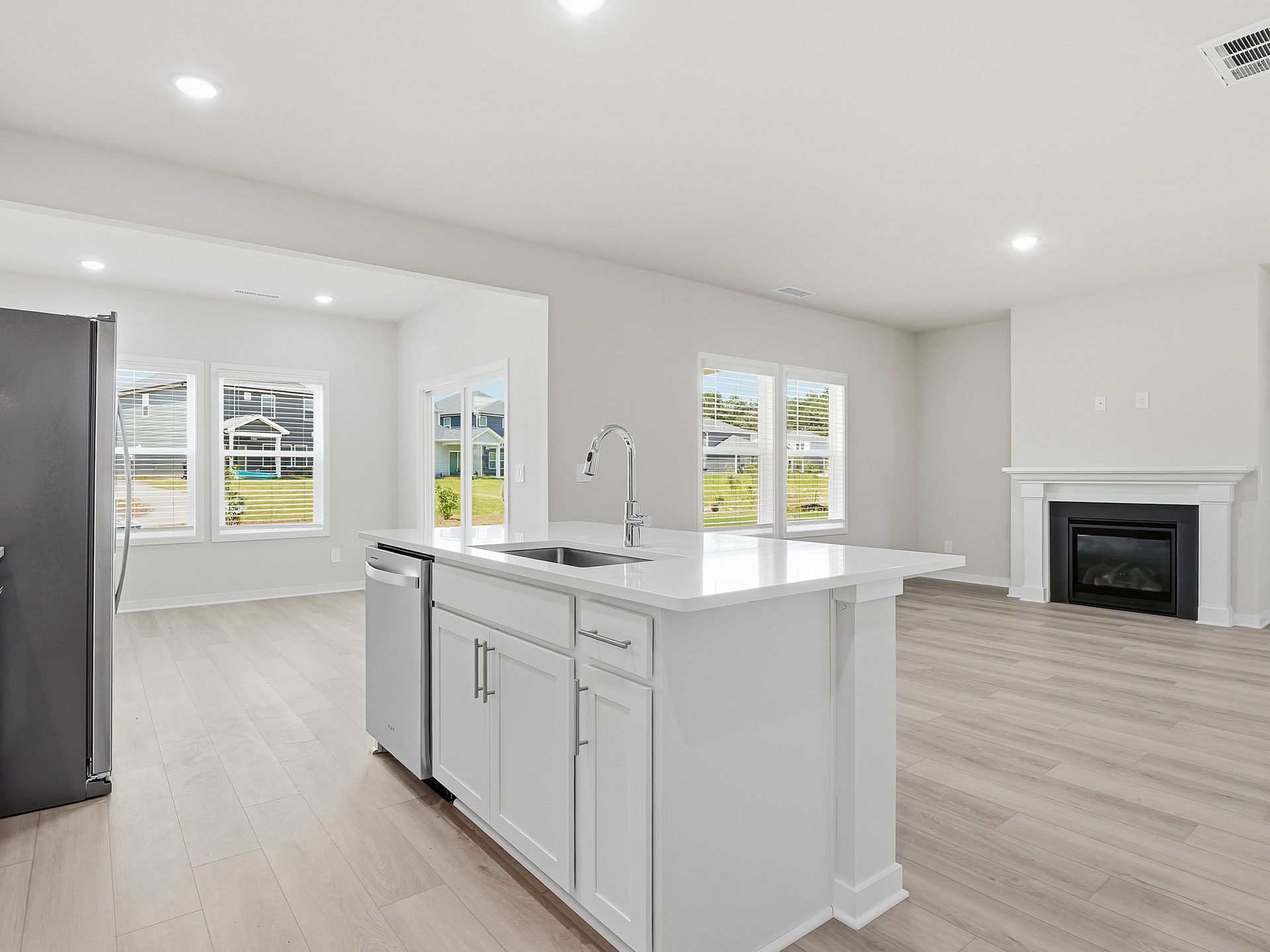Kitchen in the Dallas floorplan at a Meritage Homes community in Wendell, NC.