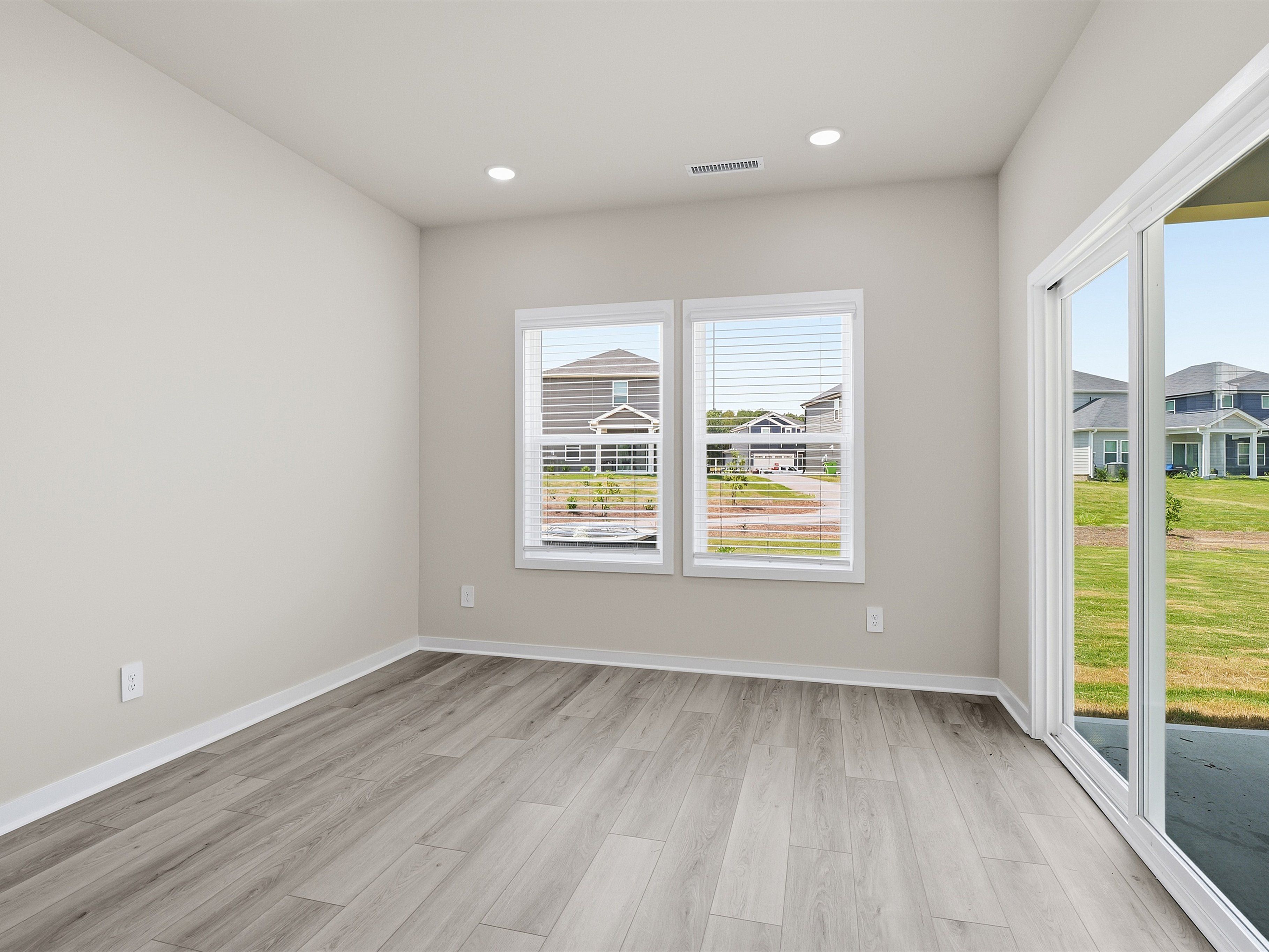 Dining area in the Dallas floorplan at a Meritage Homes community in Wendell, NC.