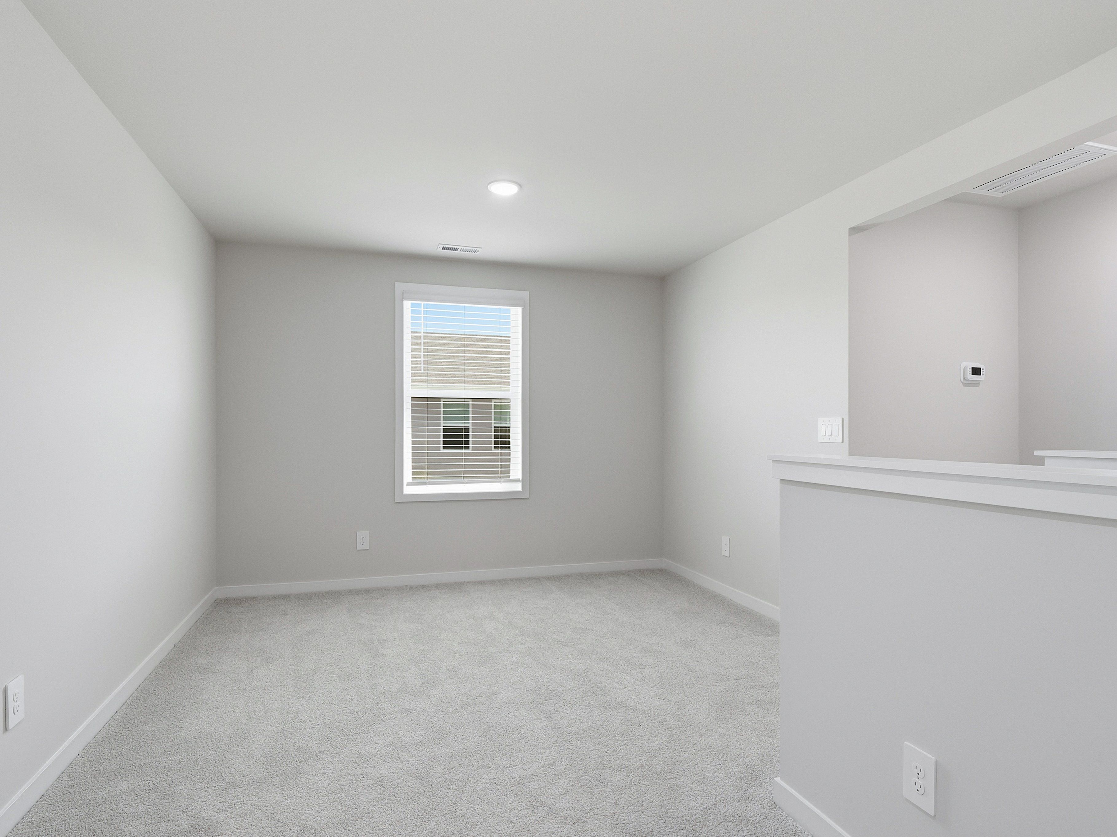 Loft in the Dallas floorplan at a Meritage Homes community in Wendell, NC.