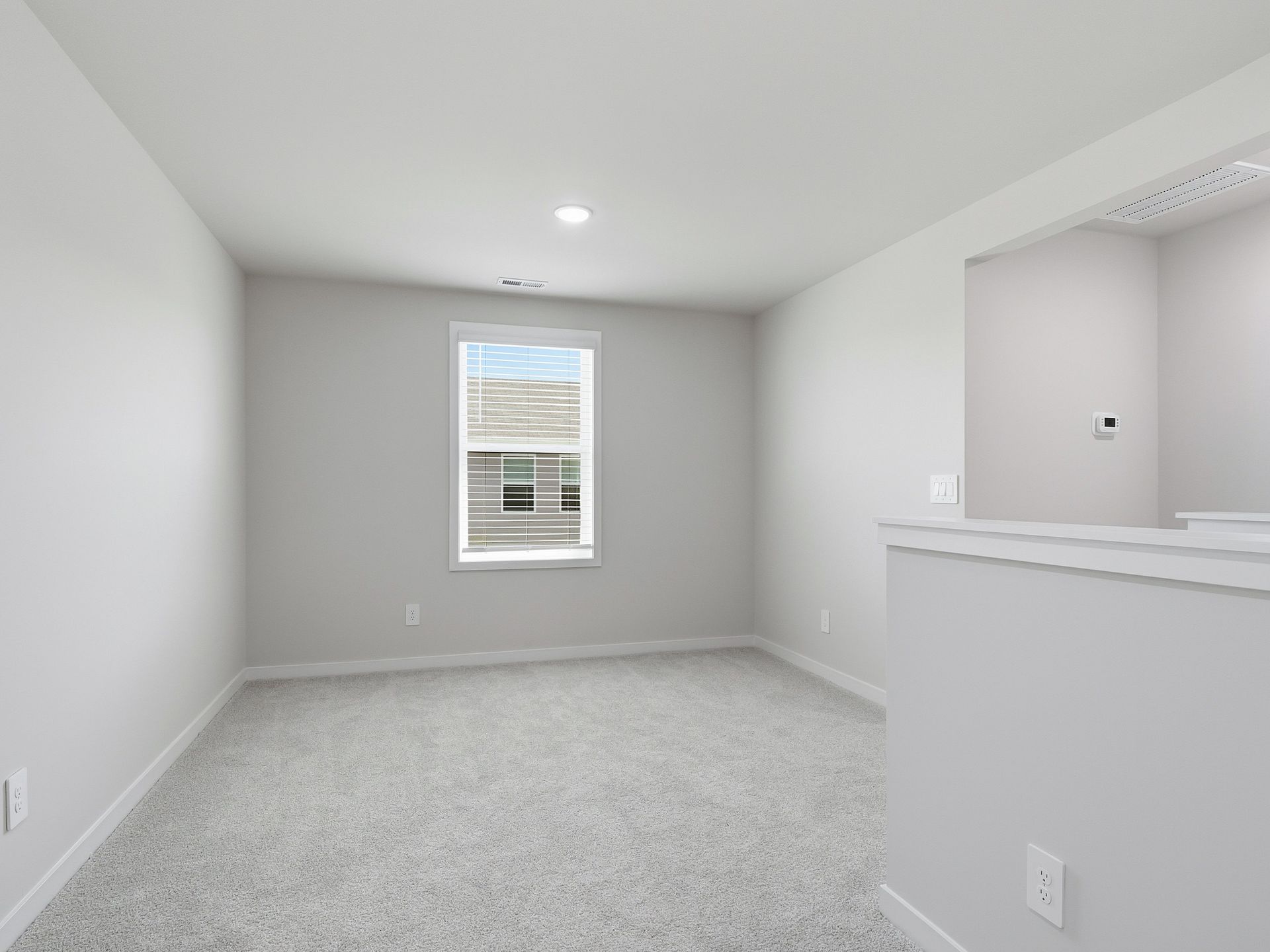 Loft in the Dallas floorplan at a Meritage Homes community in Wendell, NC.
