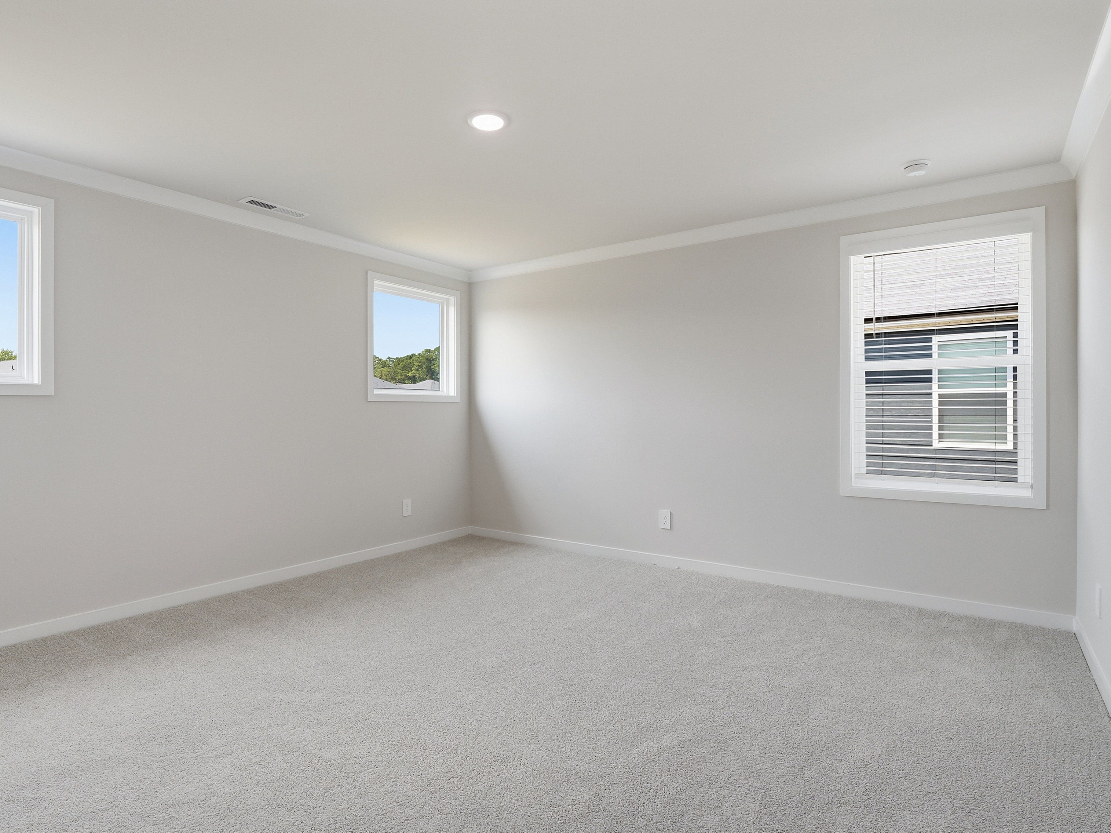Primary bedroom in the Dallas floorplan at a Meritage Homes community in Wendell, NC.