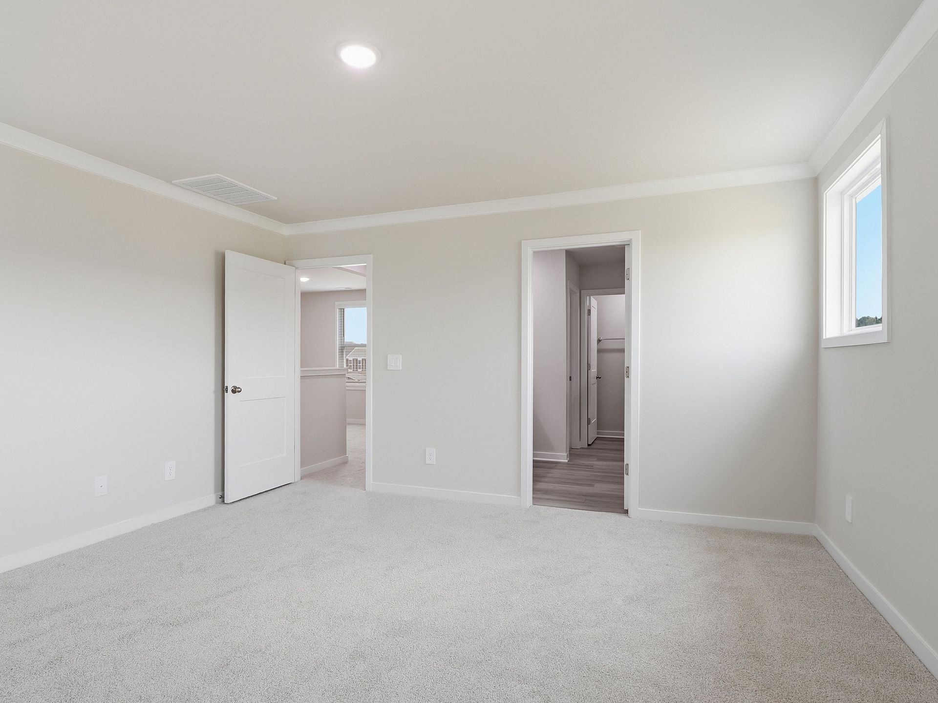 Primary bedroom in the Dallas floorplan at a Meritage Homes community in Wendell, NC.