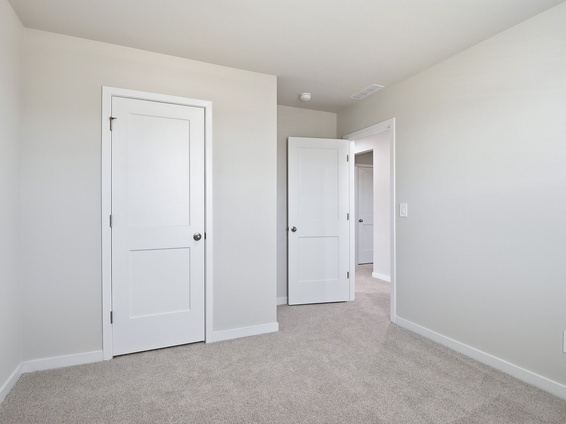 Secondary bedroom in the Dallas floorplan at a Meritage Homes community in Wendell, NC.