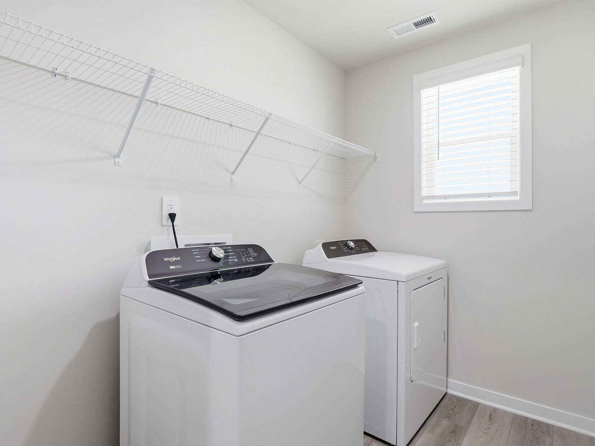 Laundry room in the Dallas floorplan at a Meritage Homes community in Wendell, NC.