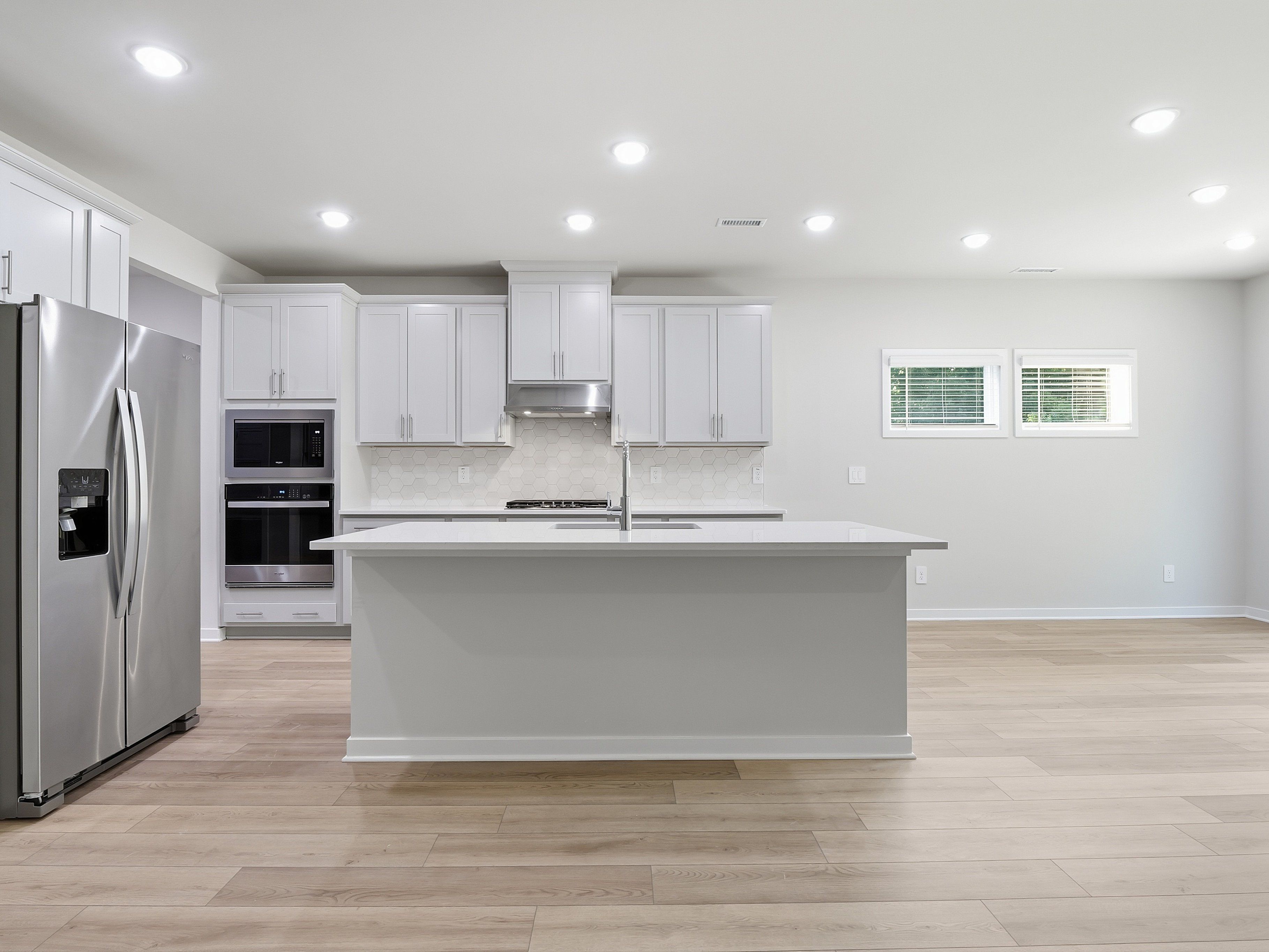 Kitchen in the Johnson floorplan at a Meritage Homes community in Wendell, NC.