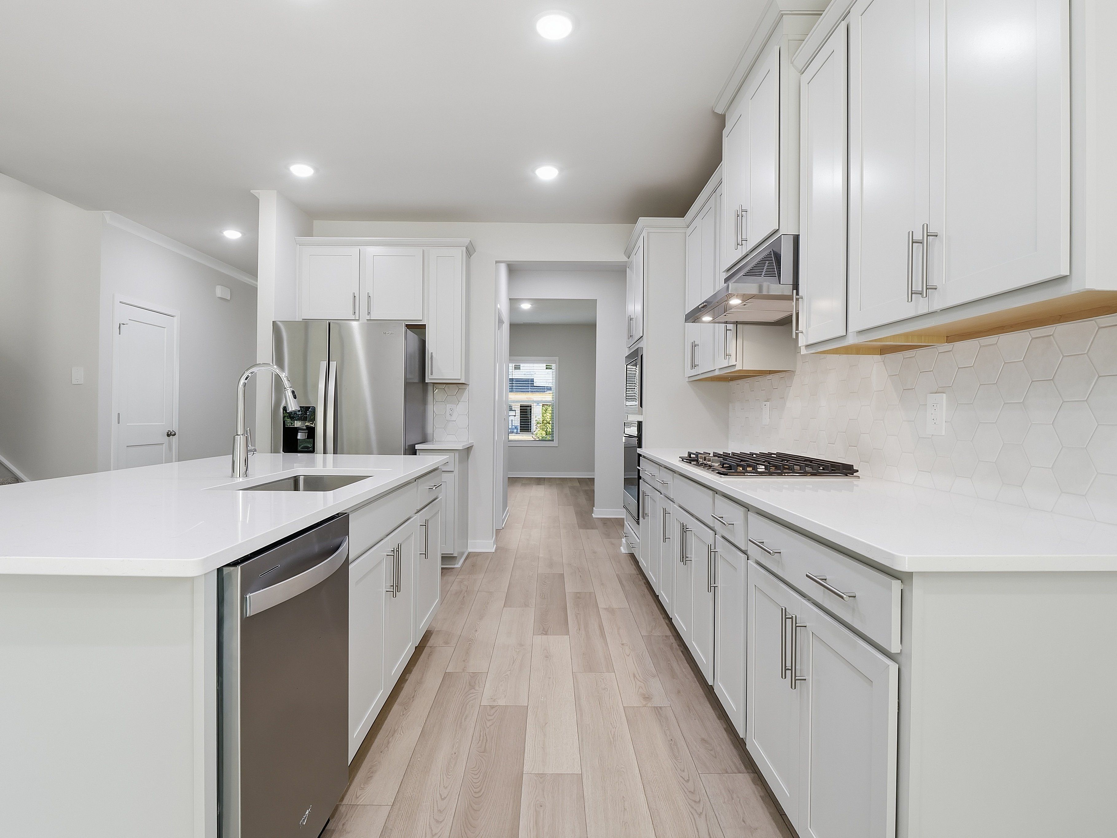 Kitchen in the Johnson floorplan at a Meritage Homes community in Wendell, NC.