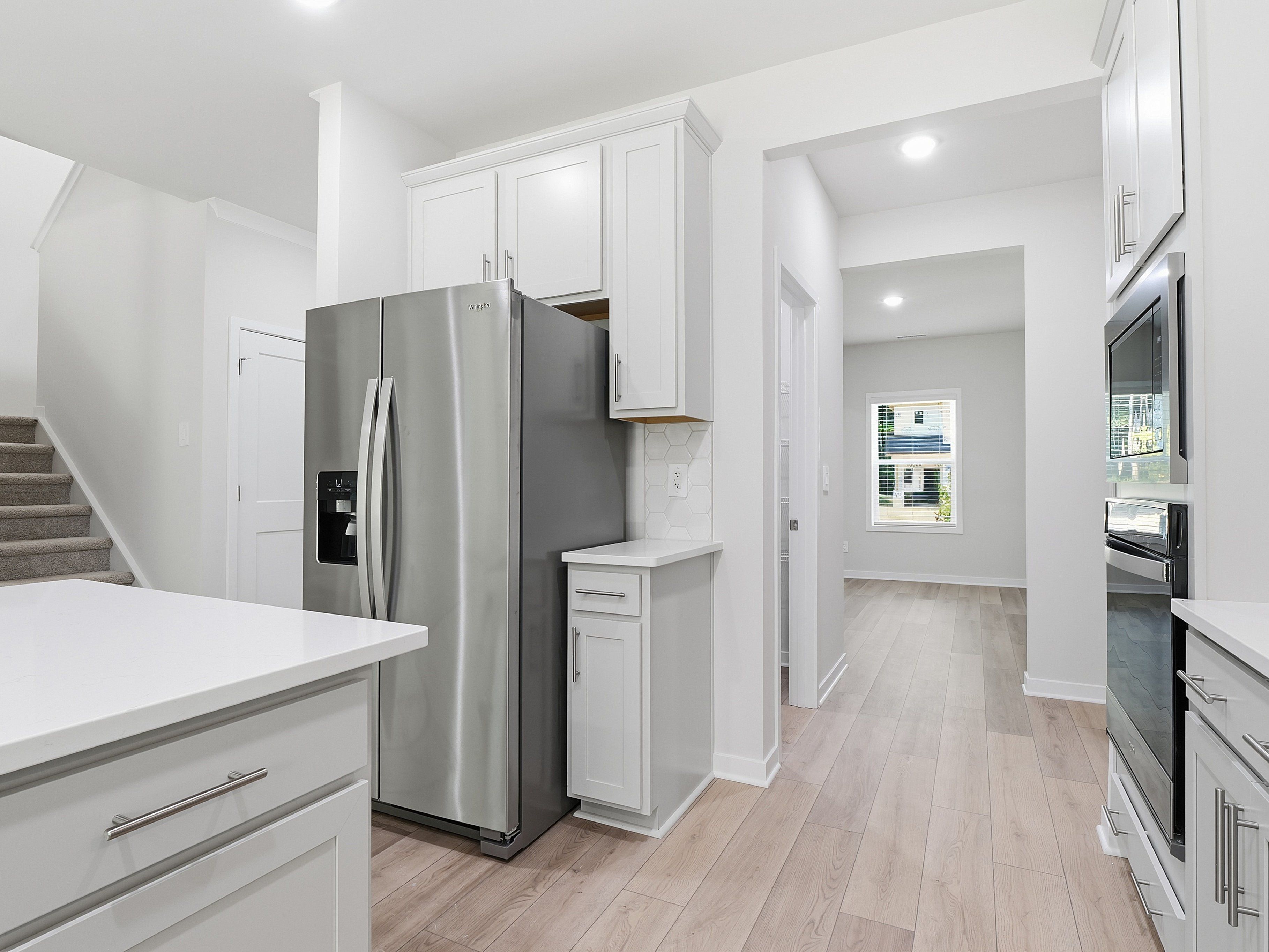 Kitchen in the Johnson floorplan at a Meritage Homes community in Wendell, NC.