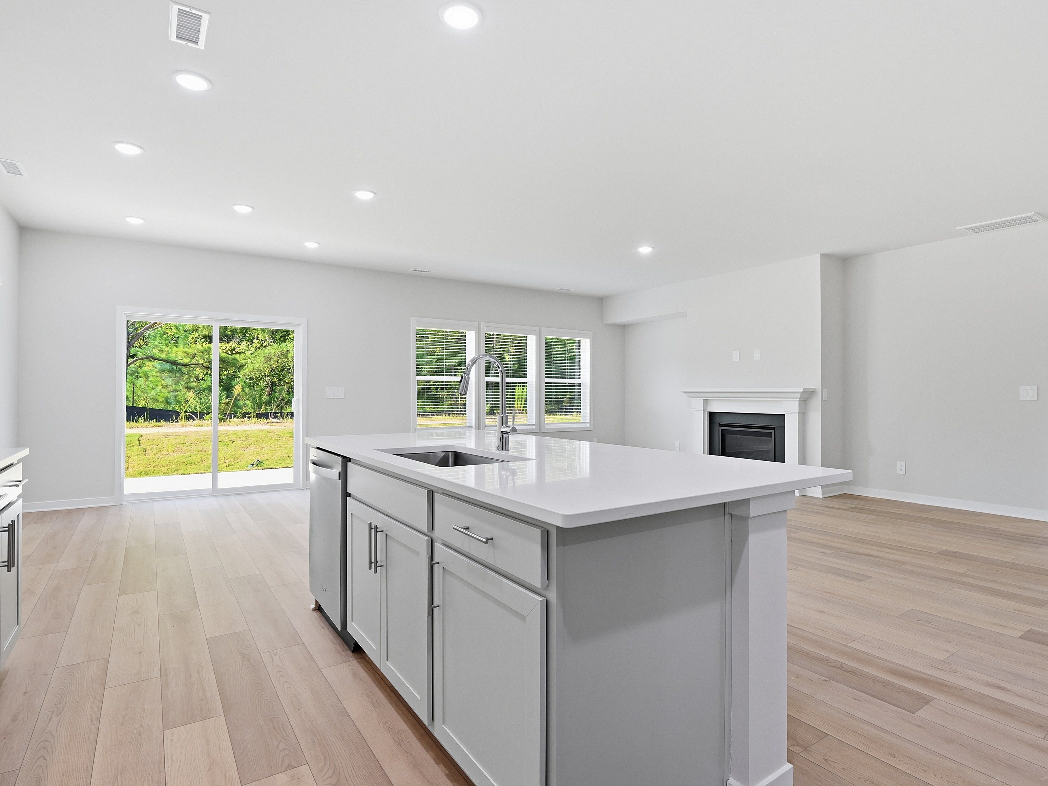 Kitchen in the Johnson floorplan at a Meritage Homes community in Wendell, NC.