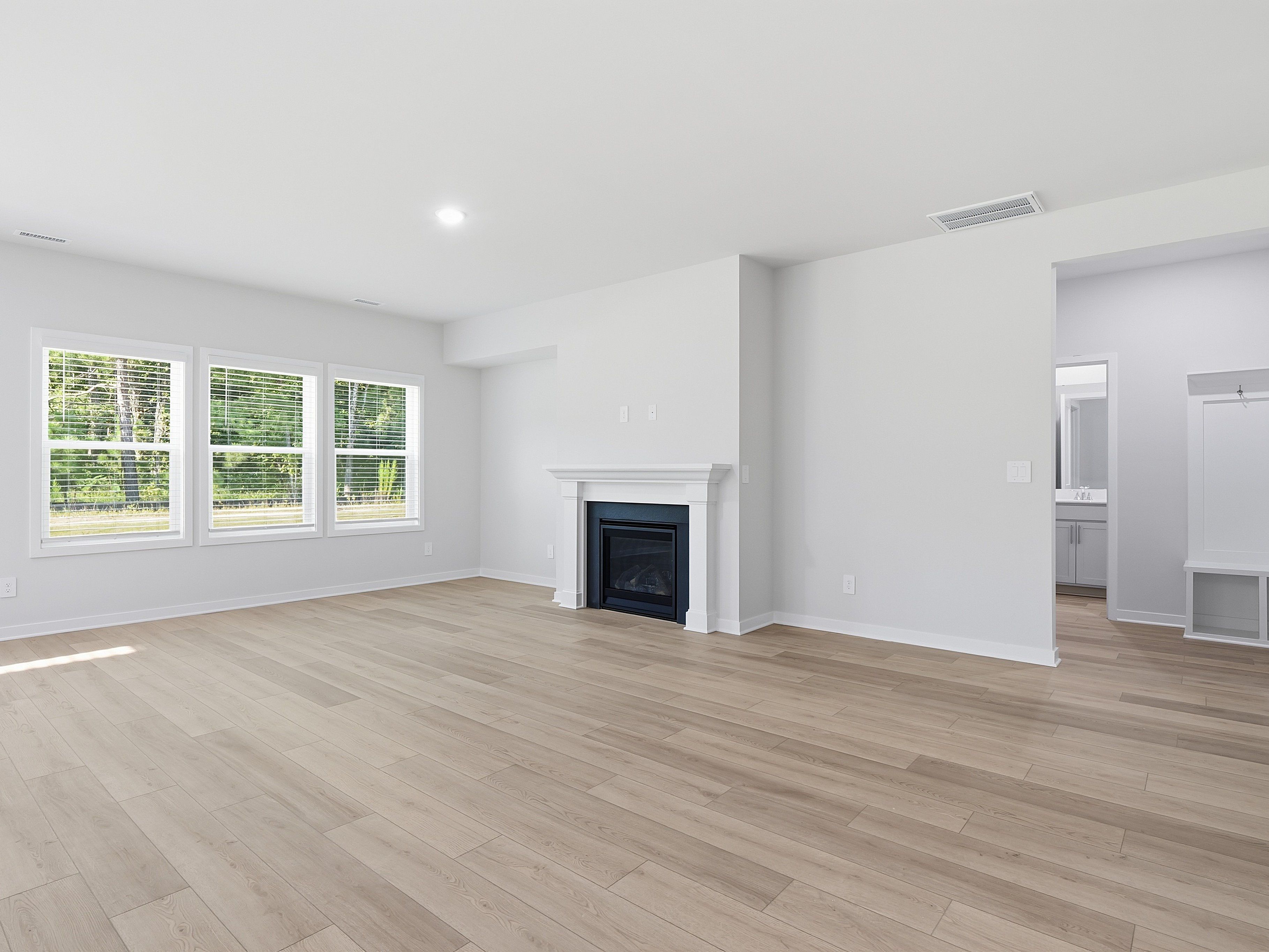 Great room in the Johnson floorplan at a Meritage Homes community in Wendell, NC.