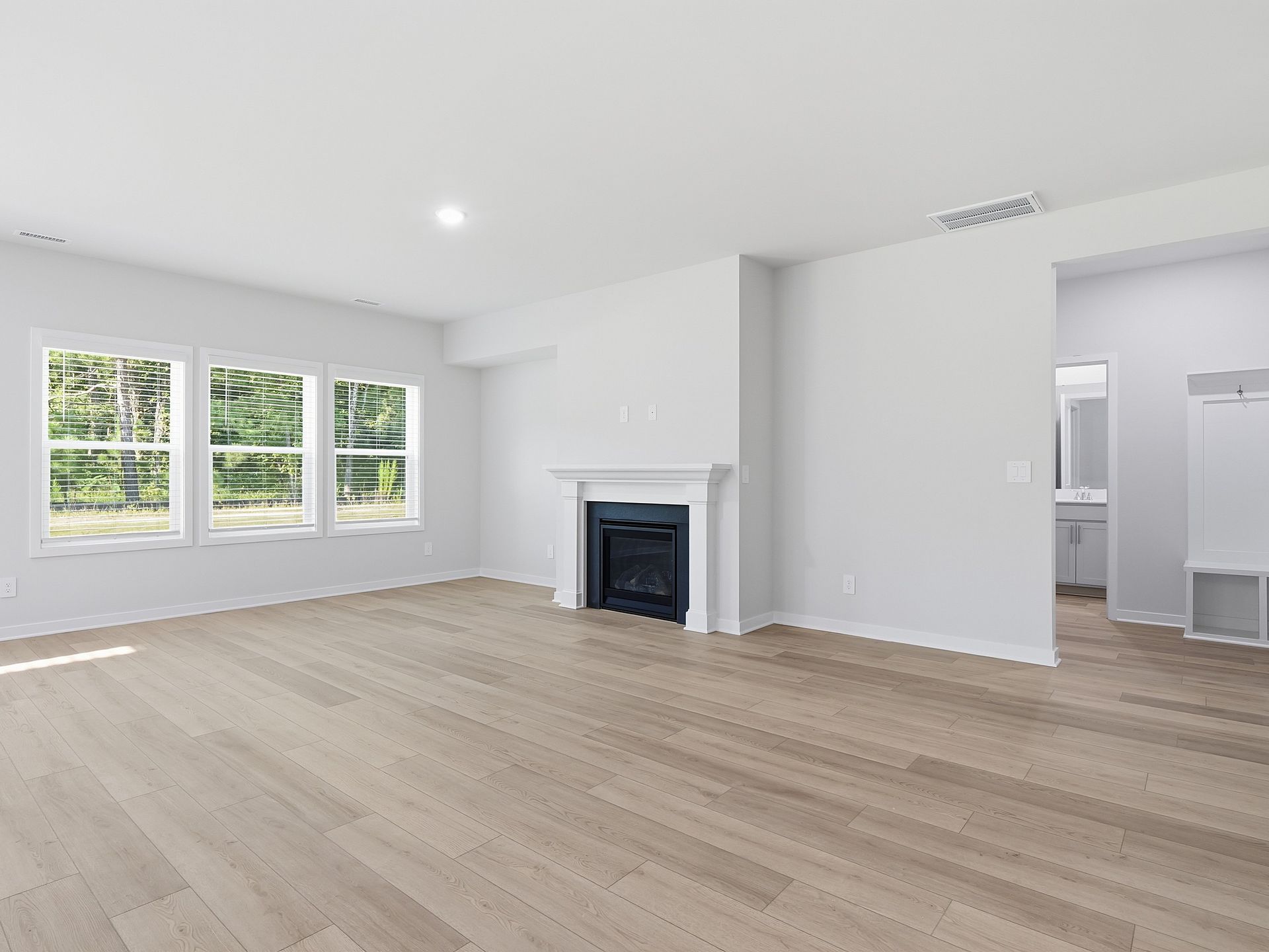 Great room in the Johnson floorplan at a Meritage Homes community in Wendell, NC.