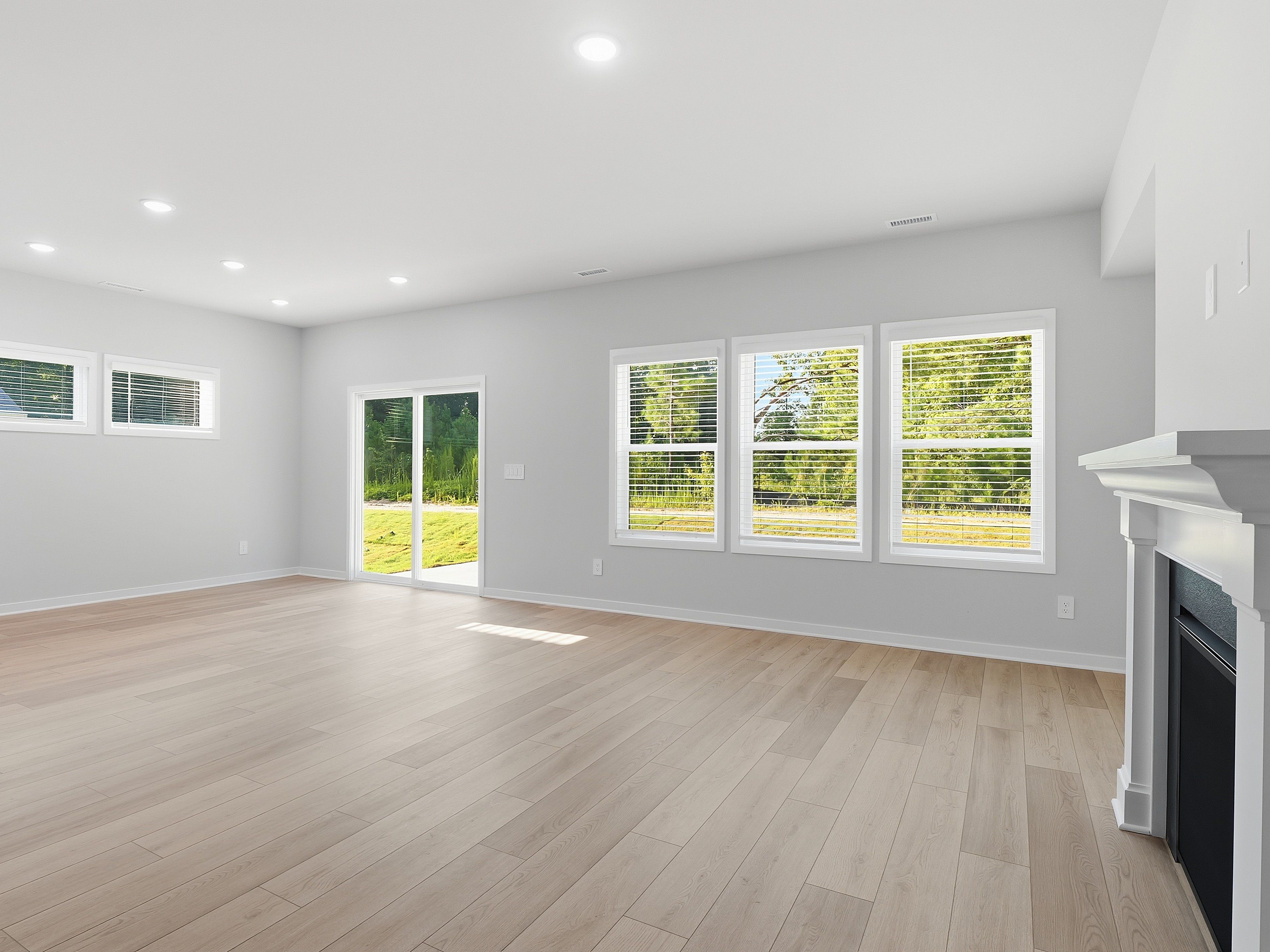 Great room in the Johnson floorplan at a Meritage Homes community in Wendell, NC.