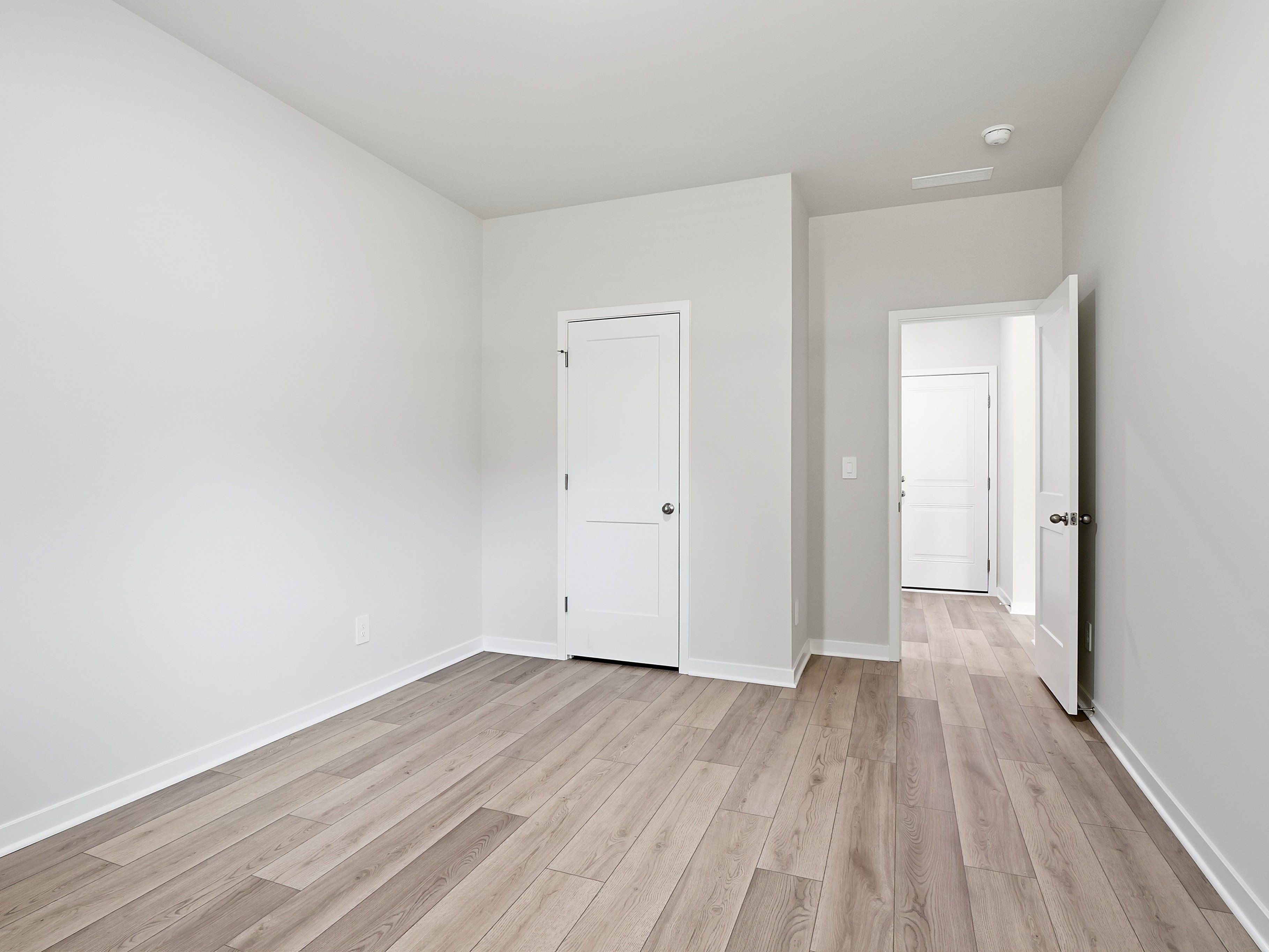 Secondary bedroom in the Johnson floorplan at a Meritage Homes community in Wendell, NC.