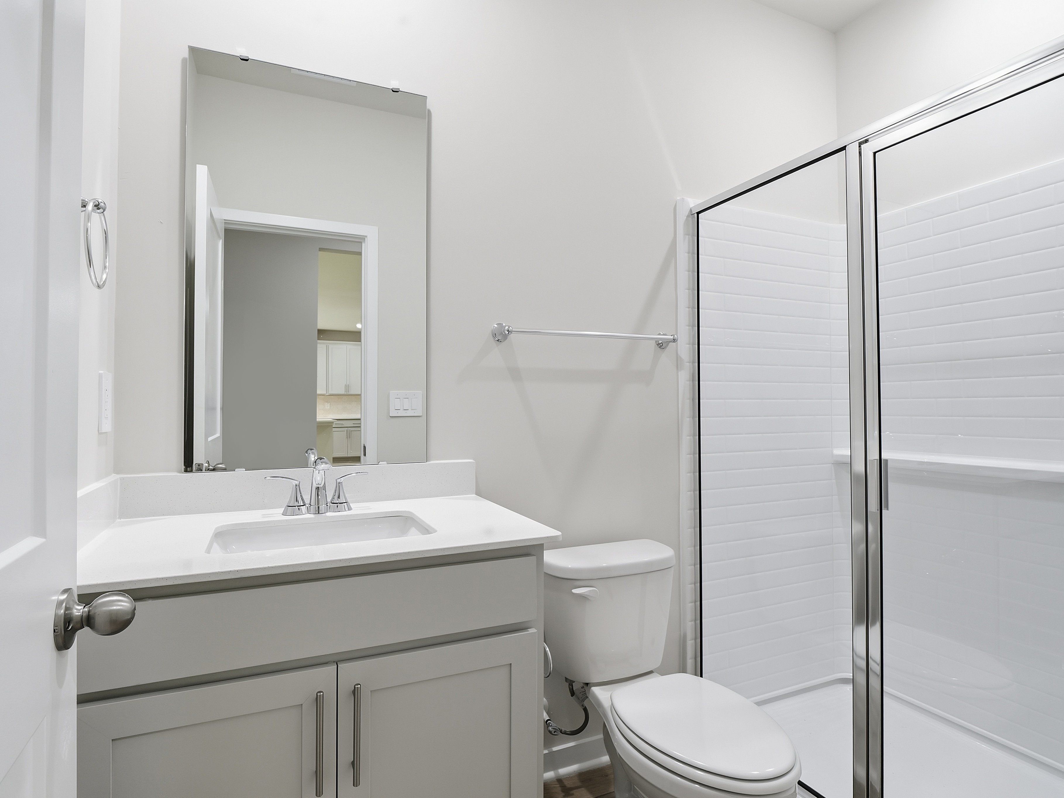 Secondary bathroom in the Johnson floorplan at a Meritage Homes community in Wendell, NC.