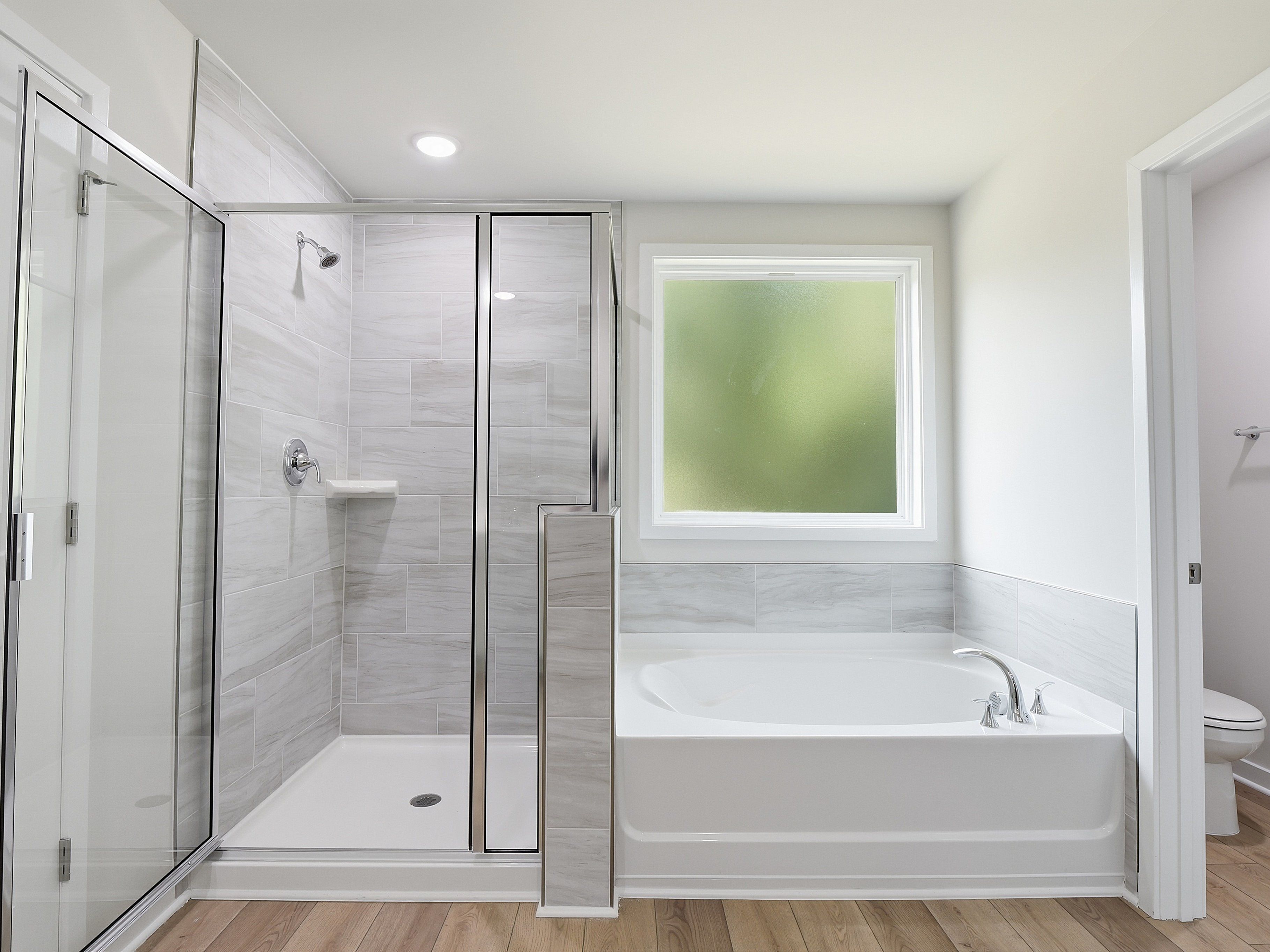 Primary bathroom in the Johnson floorplan at a Meritage Homes community in Wendell, NC.