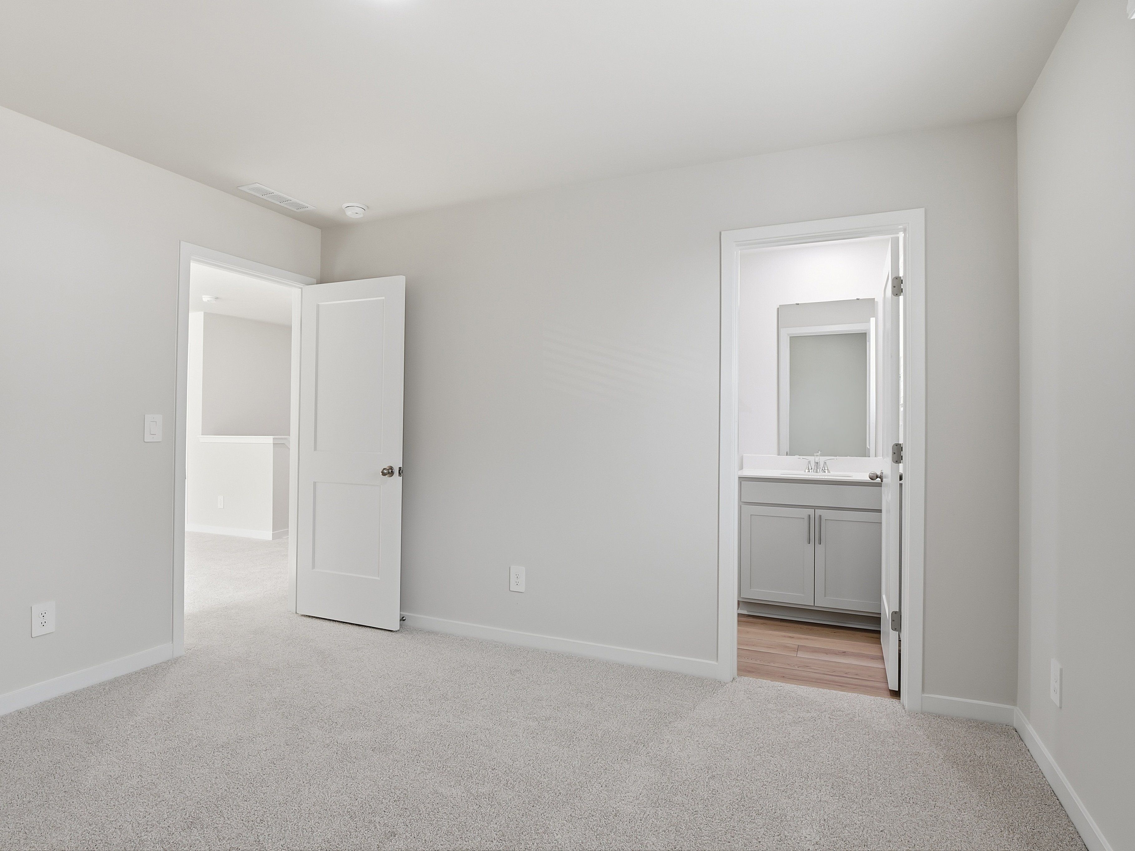 Secondary bedroom in the Johnson floorplan at a Meritage Homes community in Wendell, NC.