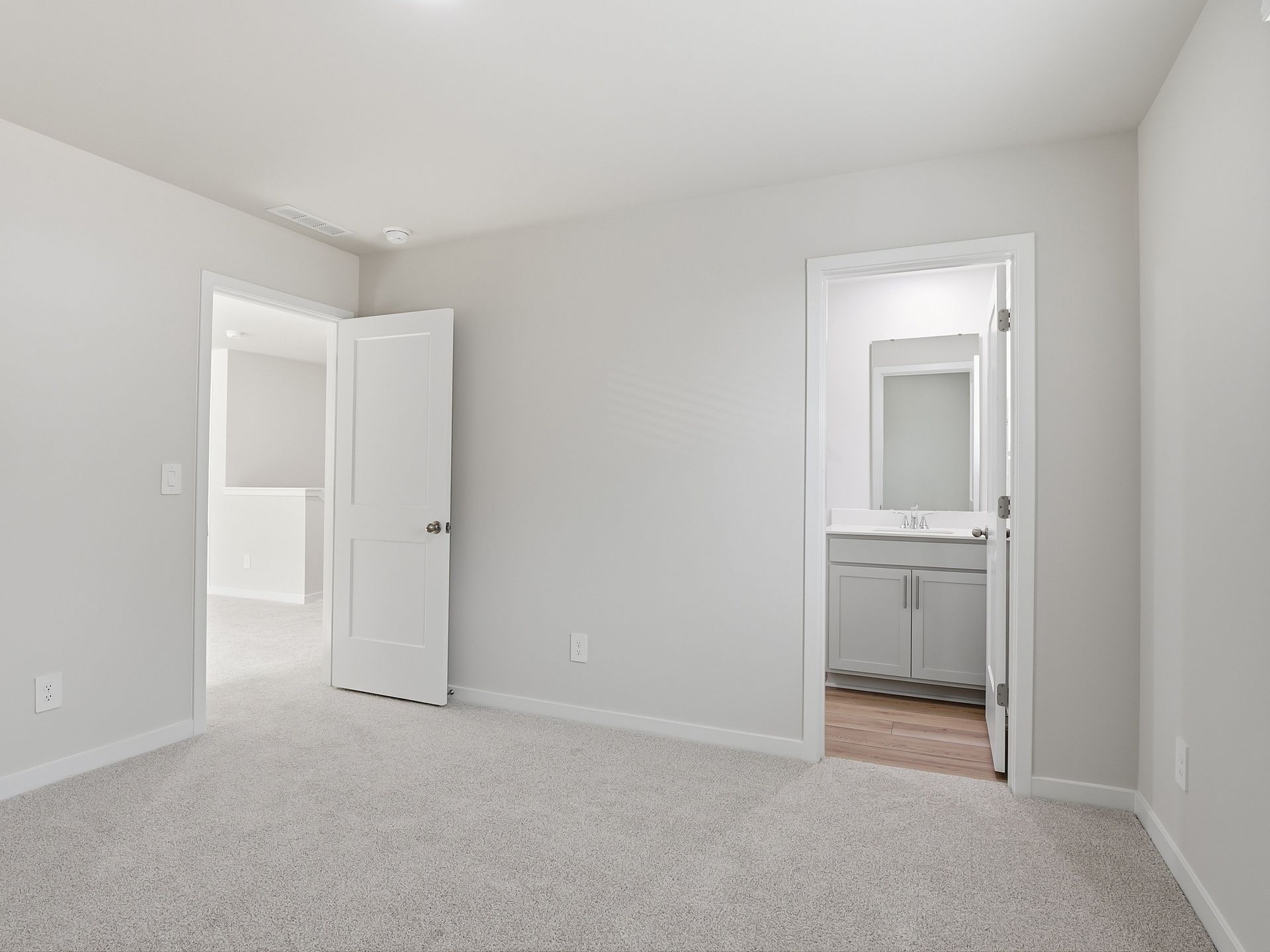Secondary bedroom in the Johnson floorplan at a Meritage Homes community in Wendell, NC.