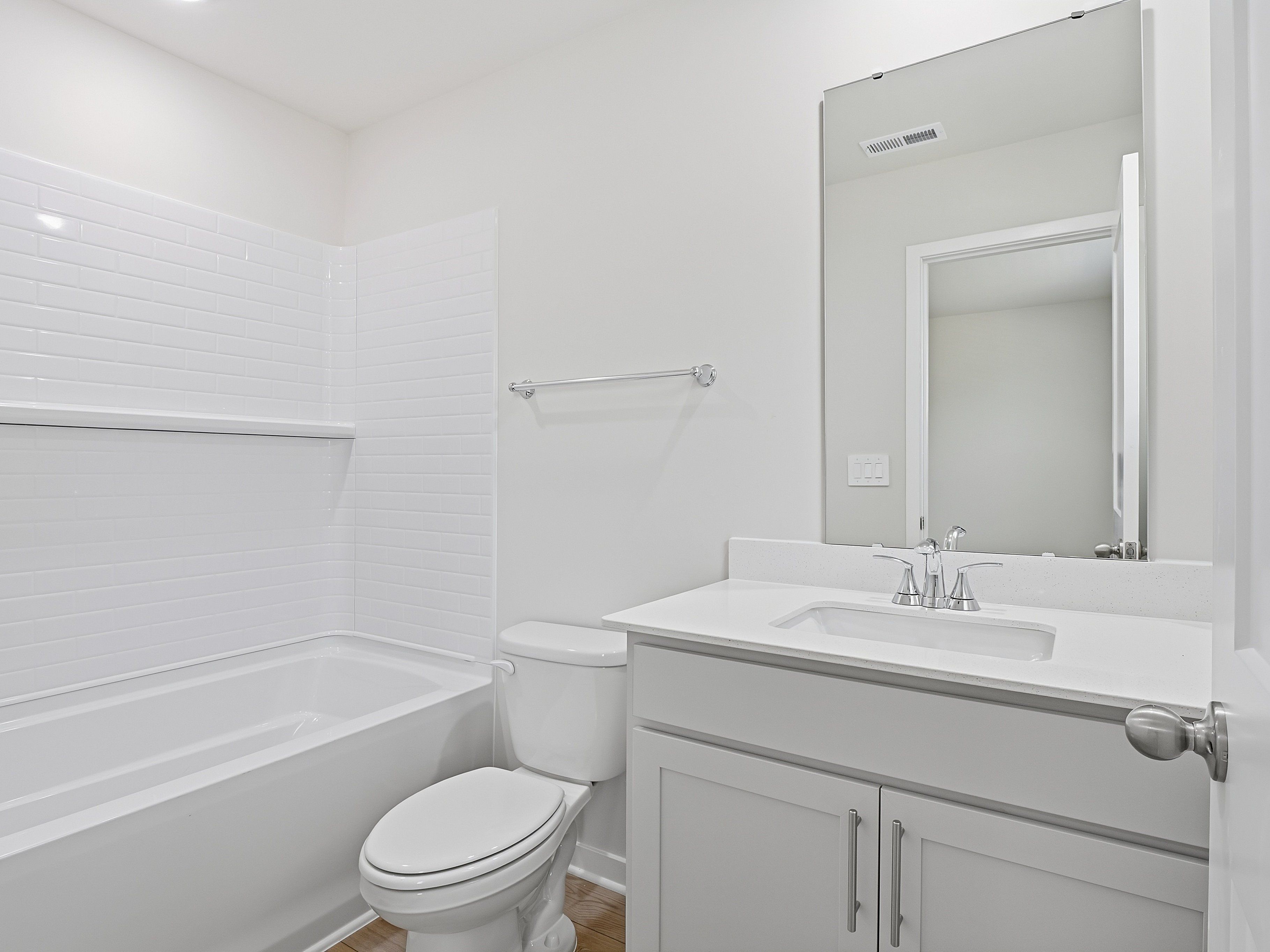 Secondary bathroom in the Johnson floorplan at a Meritage Homes community in Wendell, NC.