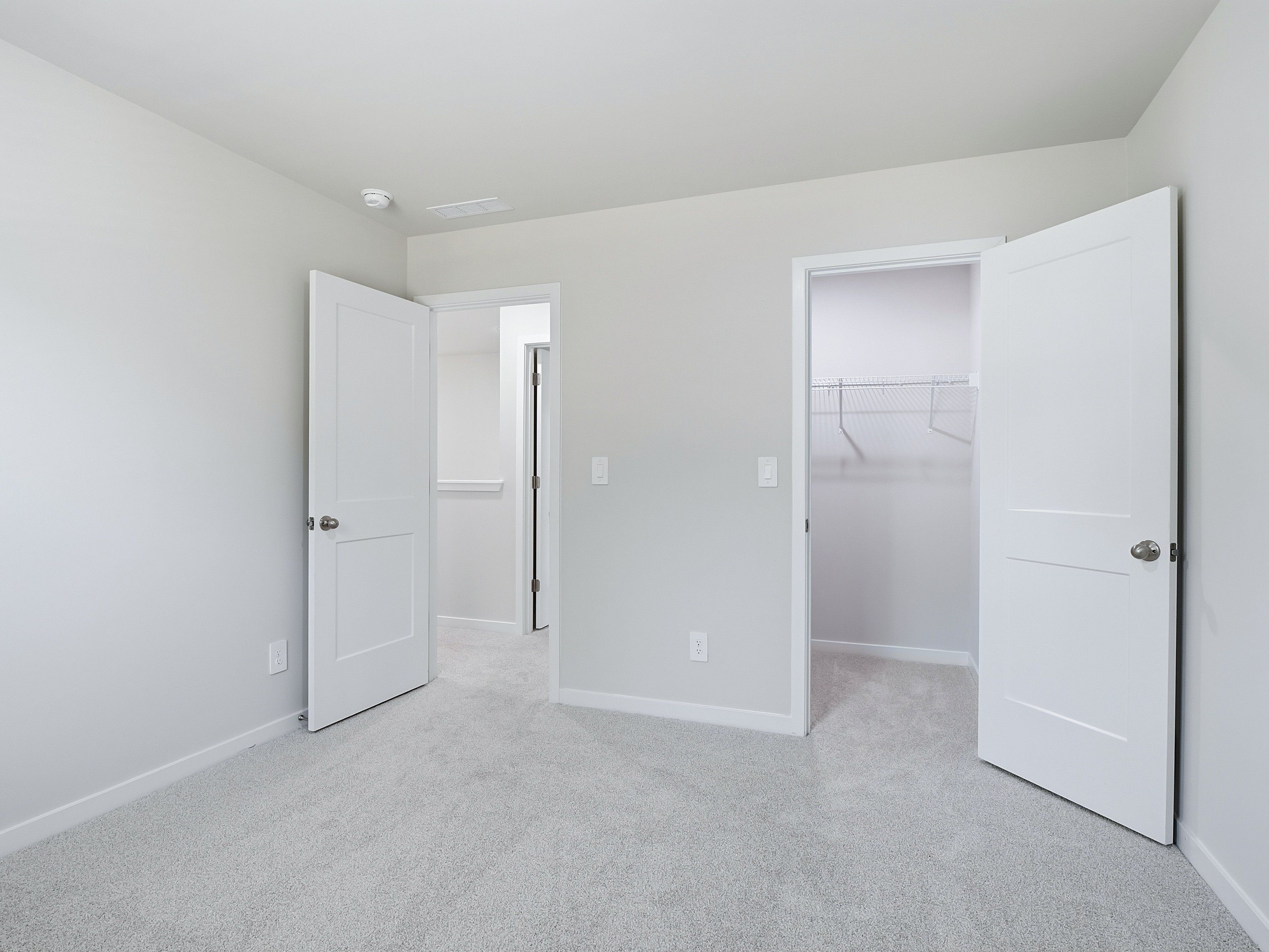 Secondary bedroom in the Johnson floorplan at a Meritage Homes community in Wendell, NC.