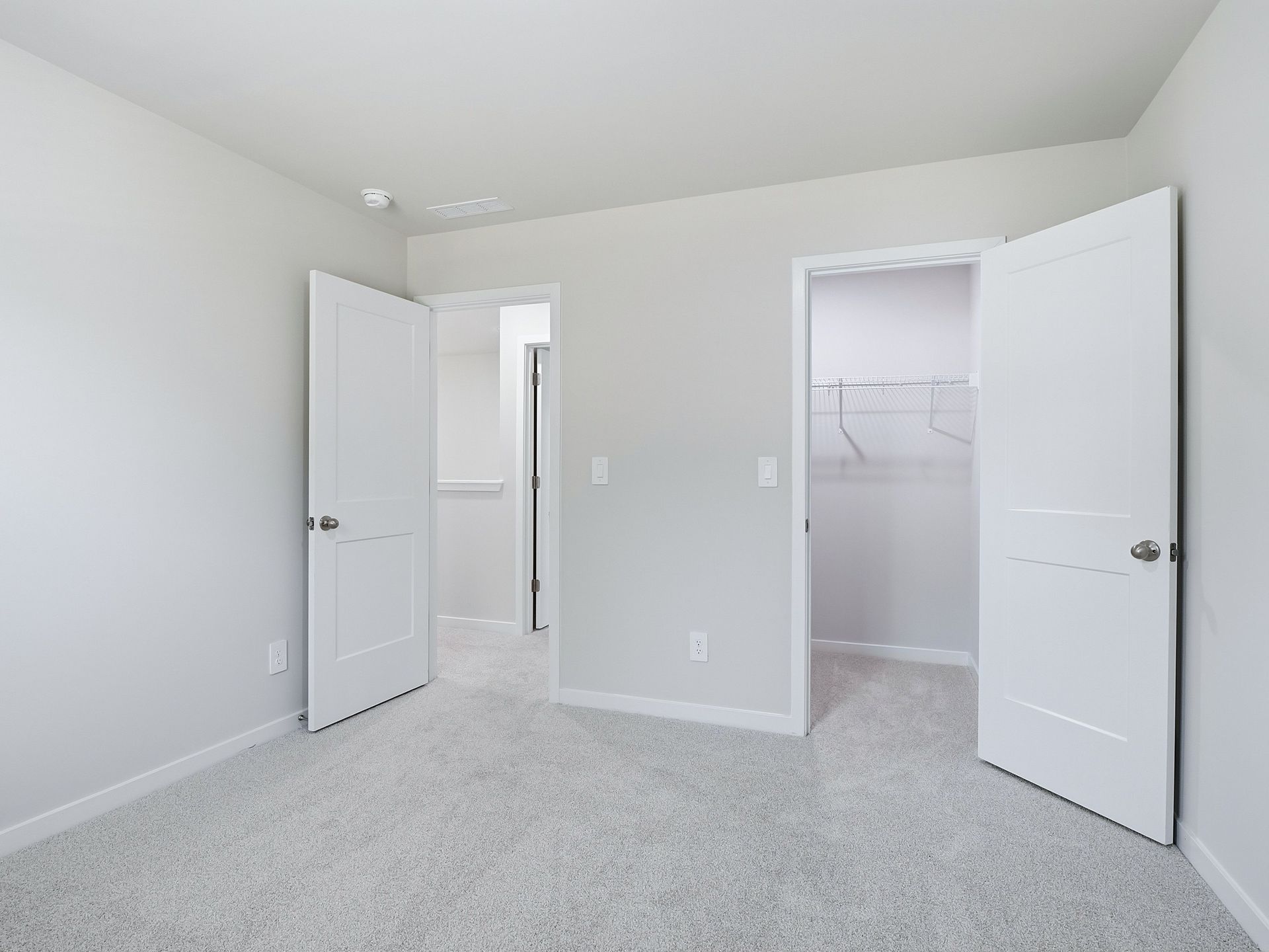 Secondary bedroom in the Johnson floorplan at a Meritage Homes community in Wendell, NC.