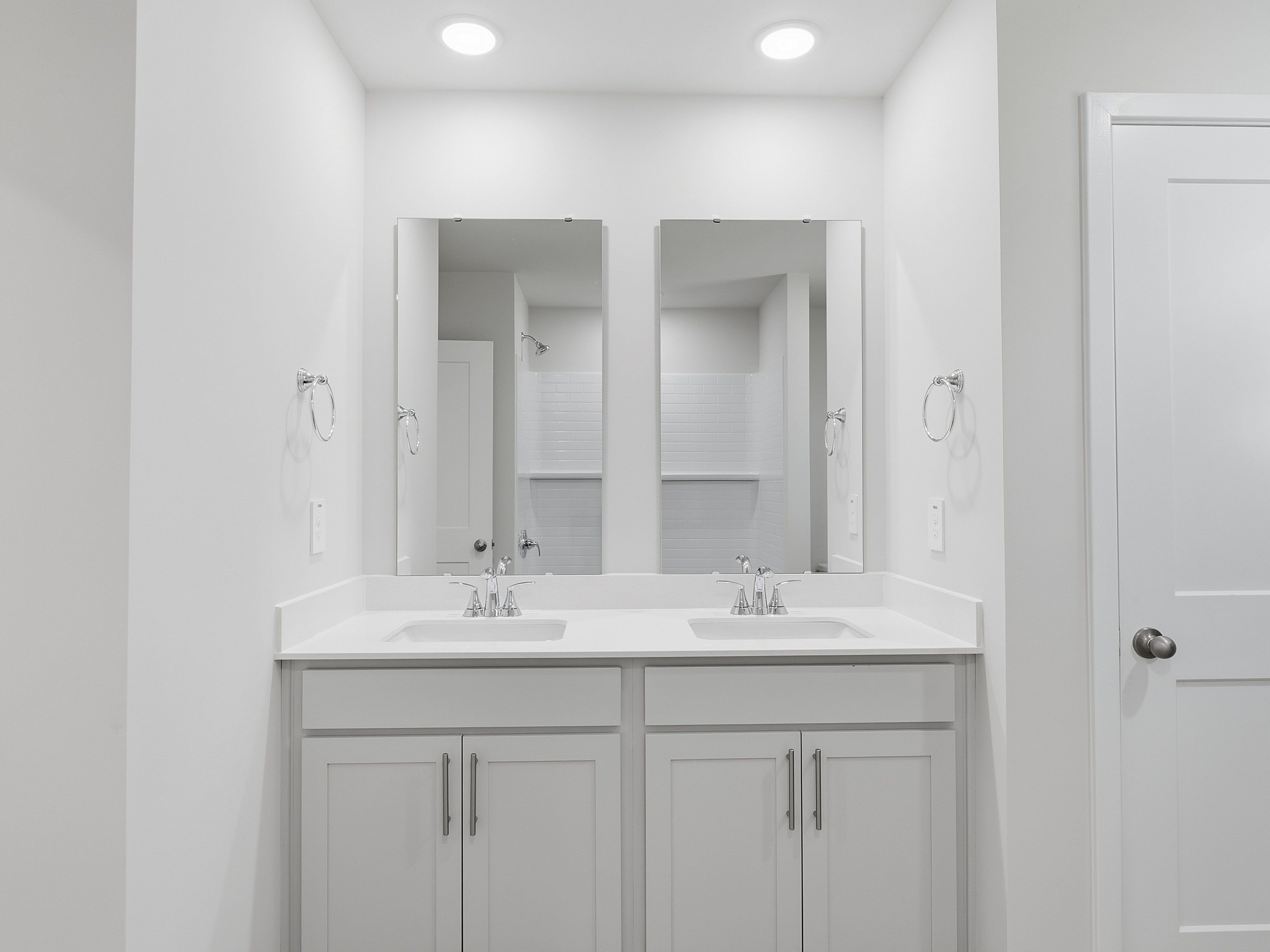 Secondary bathroom in the Johnson floorplan at a Meritage Homes community in Wendell, NC.