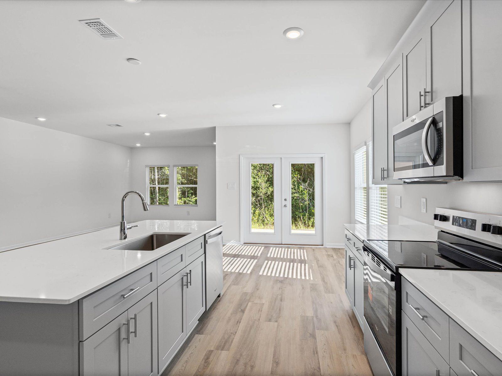 Kitchen in the Newport floorplan at a Meritage Homes community in Gulfport, MS.