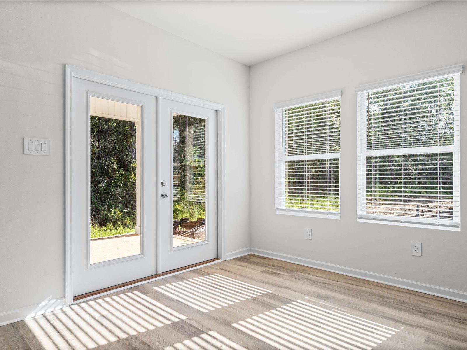 Dining Room in the Newport floorplan at a Meritage Homes community in Gulfport, MS.