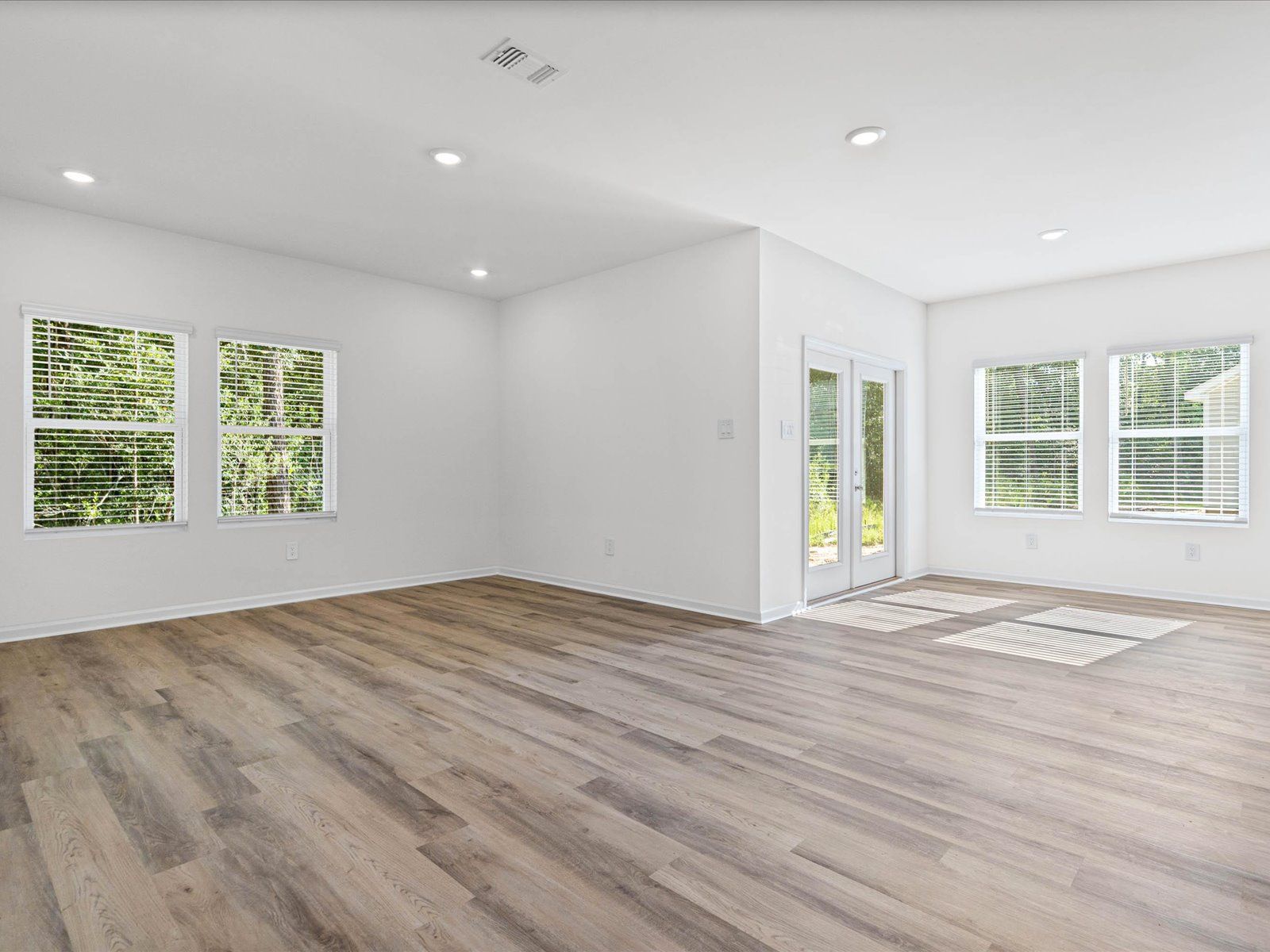 Great Room in the Newport floorplan at a Meritage Homes community in Gulfport, MS.
