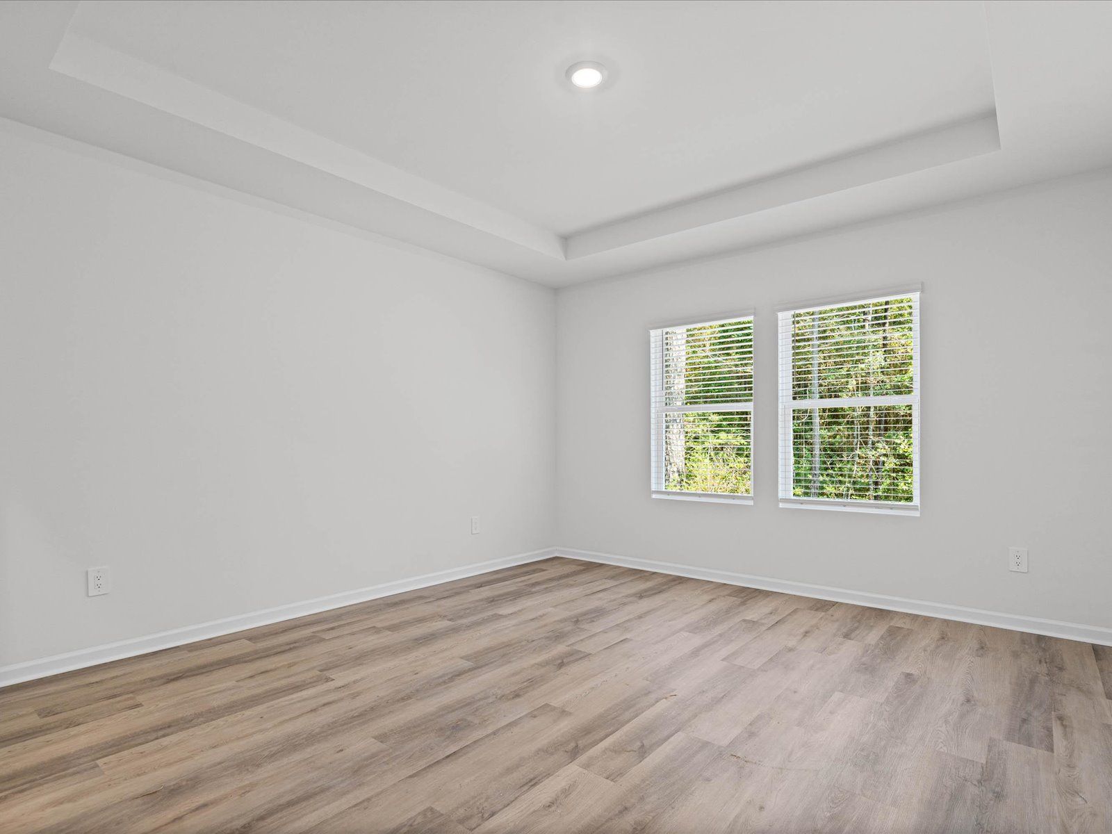 Primary Bedroom in the Newport floorplan at a Meritage Homes community in Gulfport, MS.