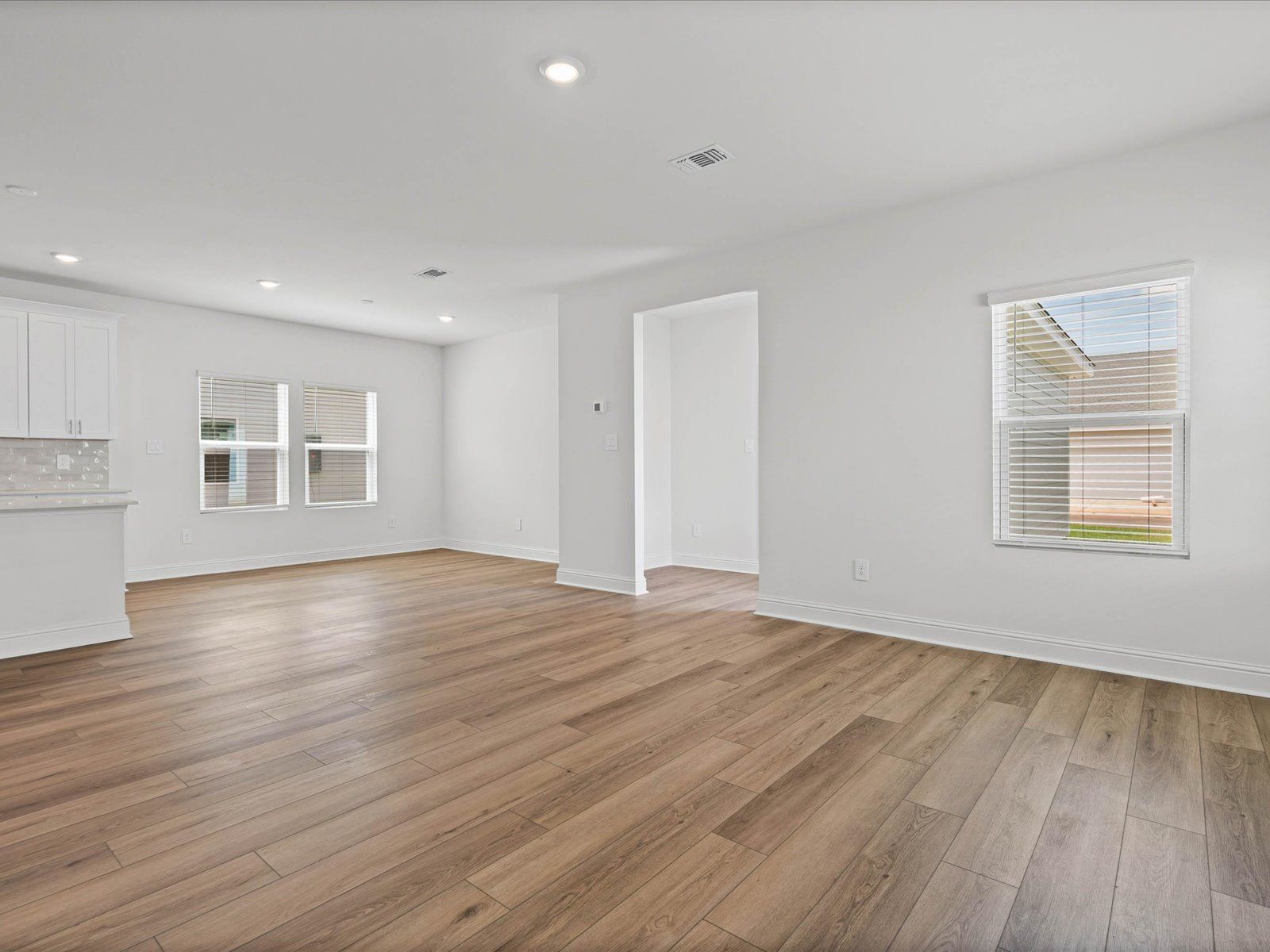 Great Room in the Fraser floorplan at a Meritage Homes community in Ocean Springs, MS.