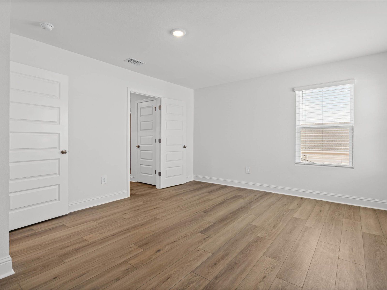 Primary Bedroom in the Fraser floorplan at a Meritage Homes community in Ocean Springs, MS.