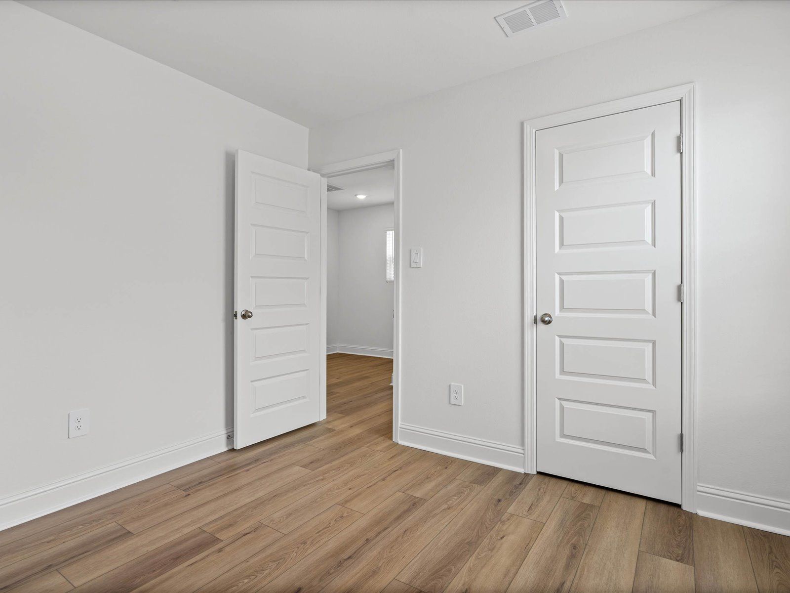 Secondary Bedroom in the Fraser floorplan at a Meritage Homes community in Ocean Springs, MS.