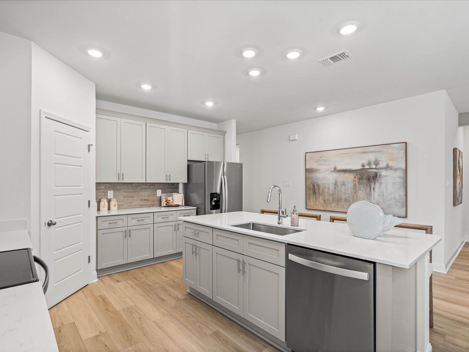 Kitchen in the Newport floorplan at a Meritage Homes community in Gulfport, MS.