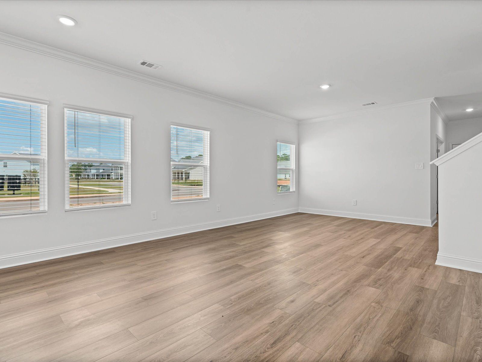 Great Room in the Mackenzie floorplan at a Meritage Homes community in Ocean Springs, MS.