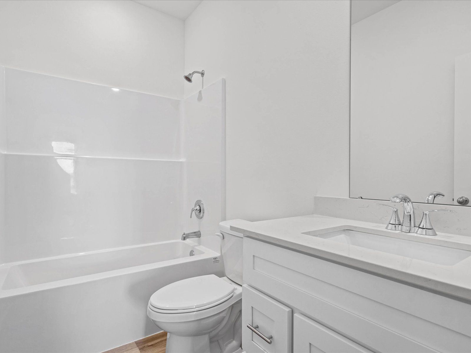 Secondary Bathroom in the Mackenzie floorplan at a Meritage Homes community in Ocean Springs, MS.