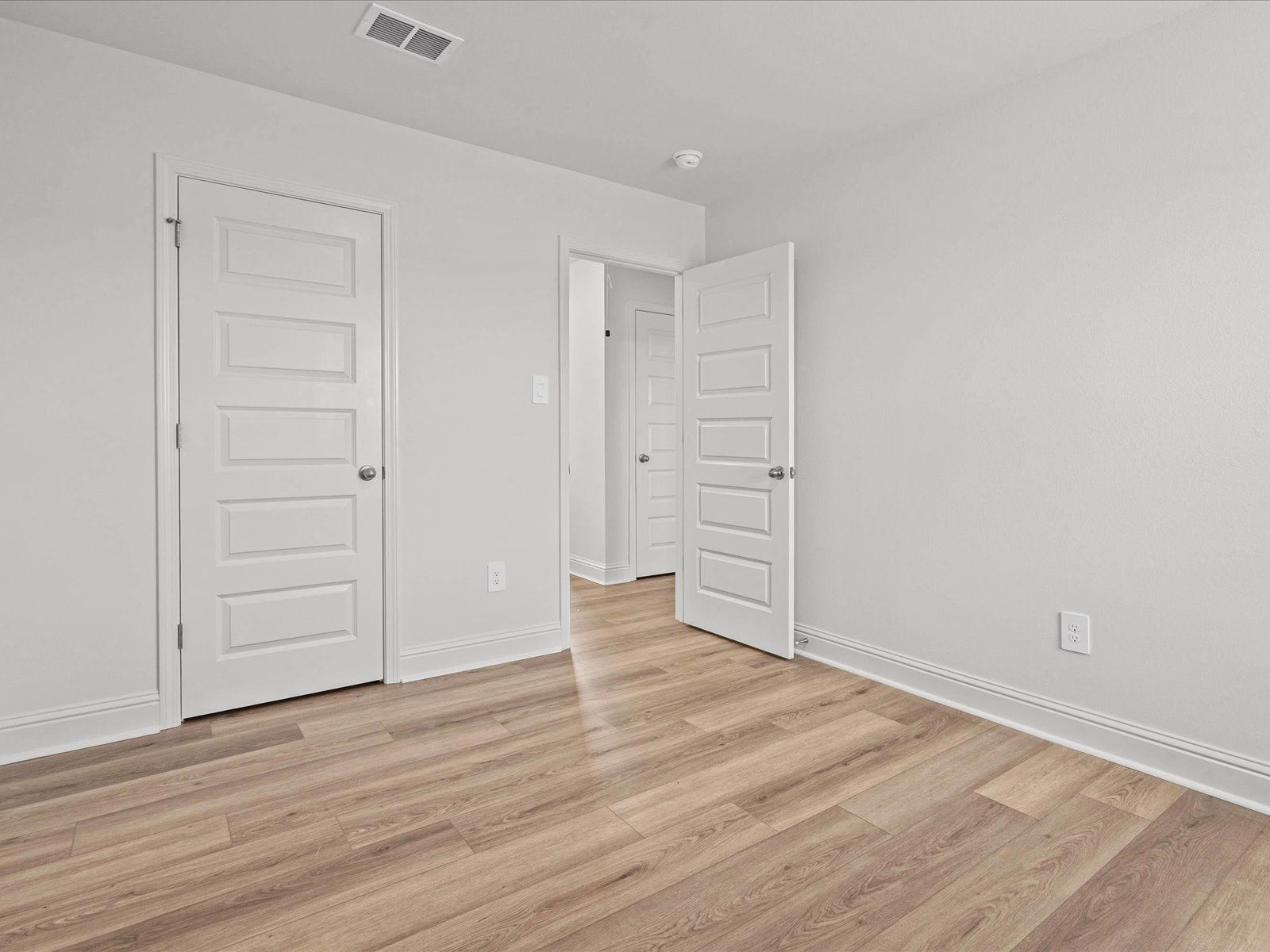 Secondary Bedroom in the Mackenzie floorplan at a Meritage Homes community in Ocean Springs, MS.