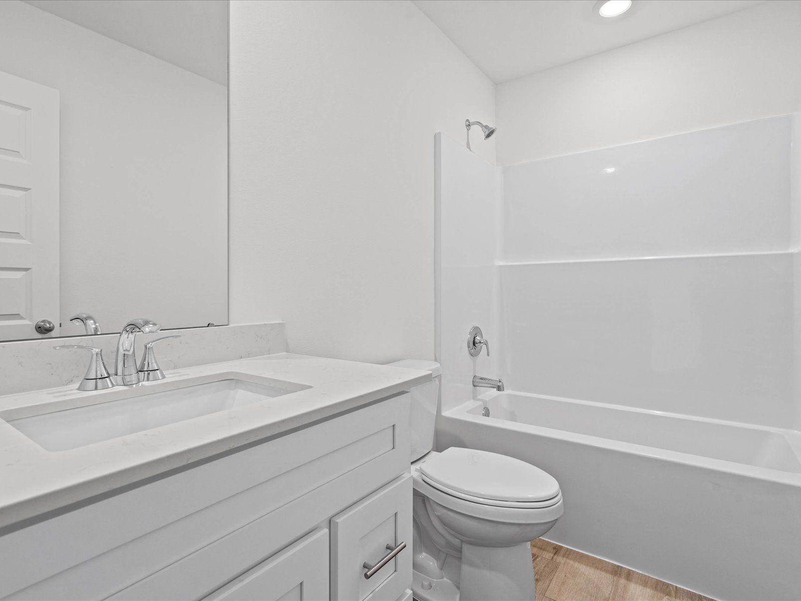 Secondary Bathroom in the Mackenzie floorplan at a Meritage Homes community in Ocean Springs, MS.