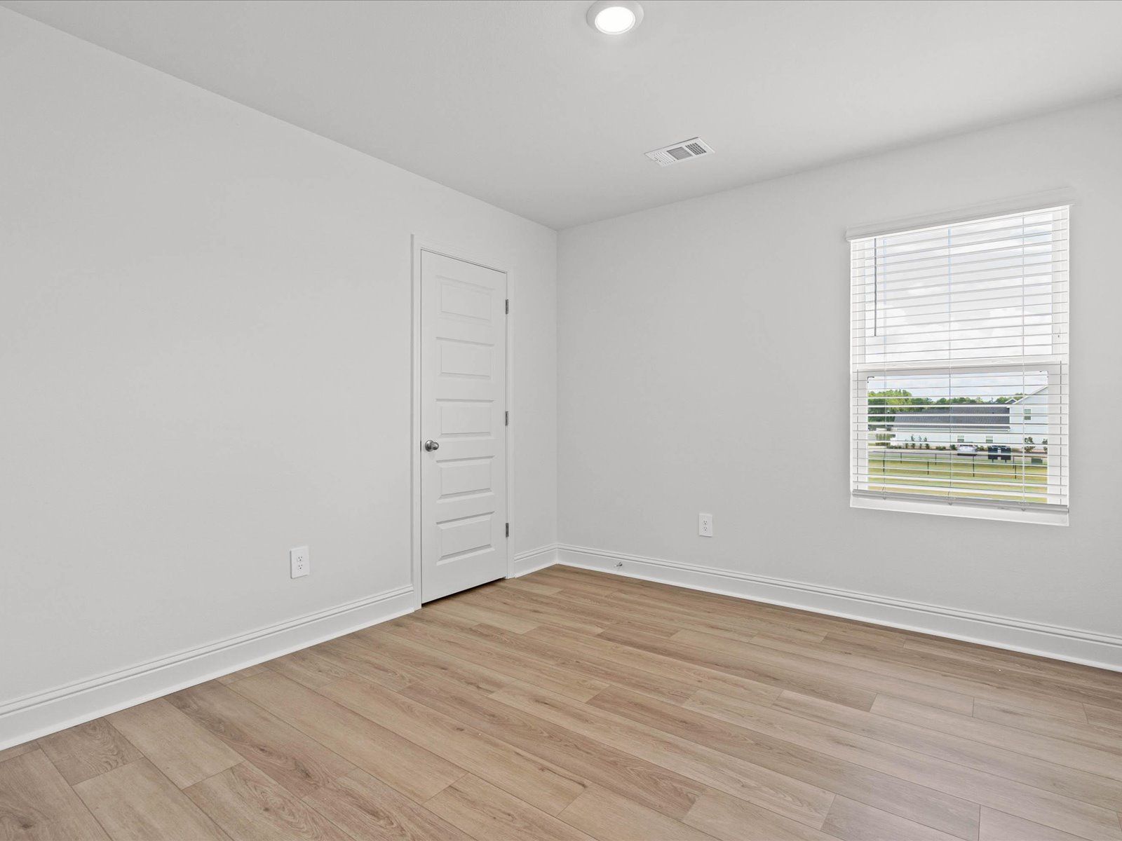 Secondary Bedroom in the Mackenzie floorplan at a Meritage Homes community in Ocean Springs, MS.