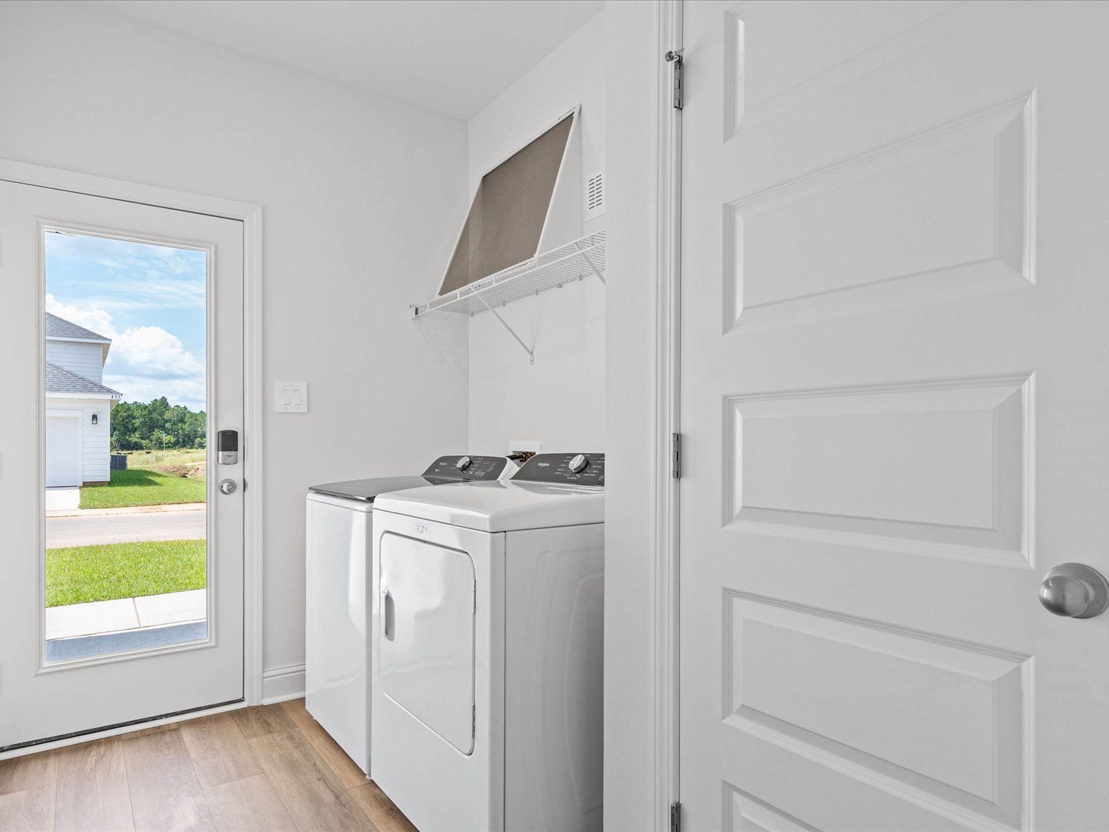 Laundry Room in the Mackenzie floorplan at a Meritage Homes community in Ocean Springs, MS.
